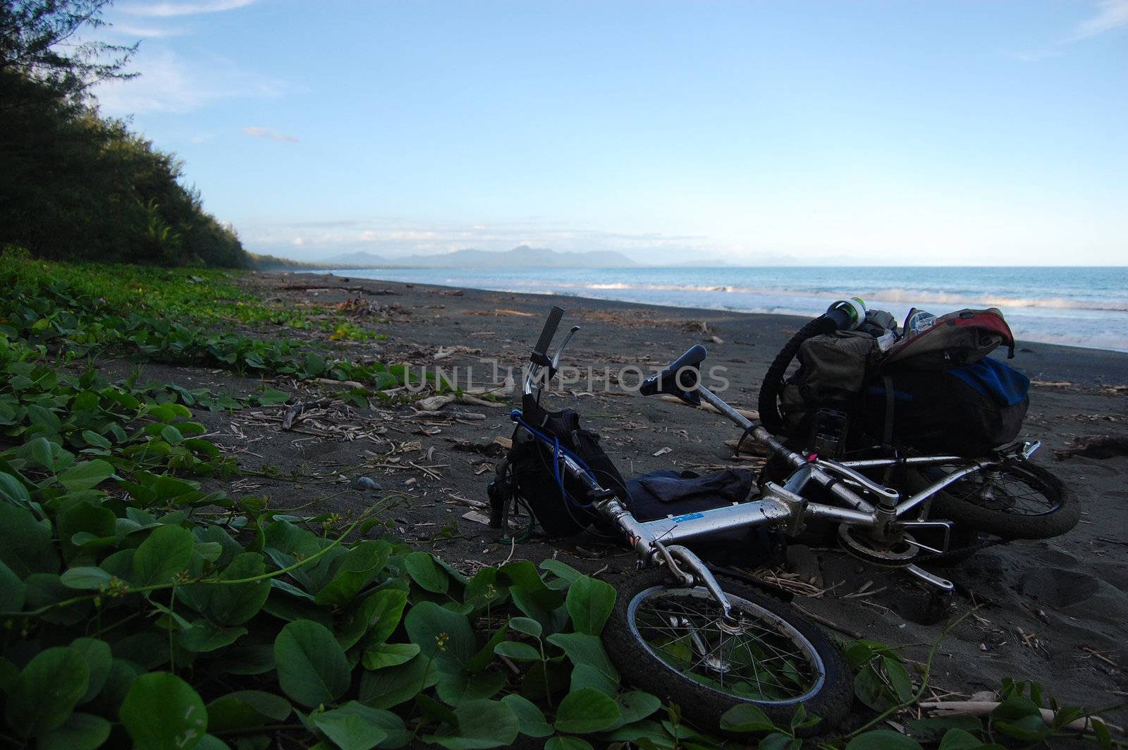 Folding bicycle at sand coast by danemo