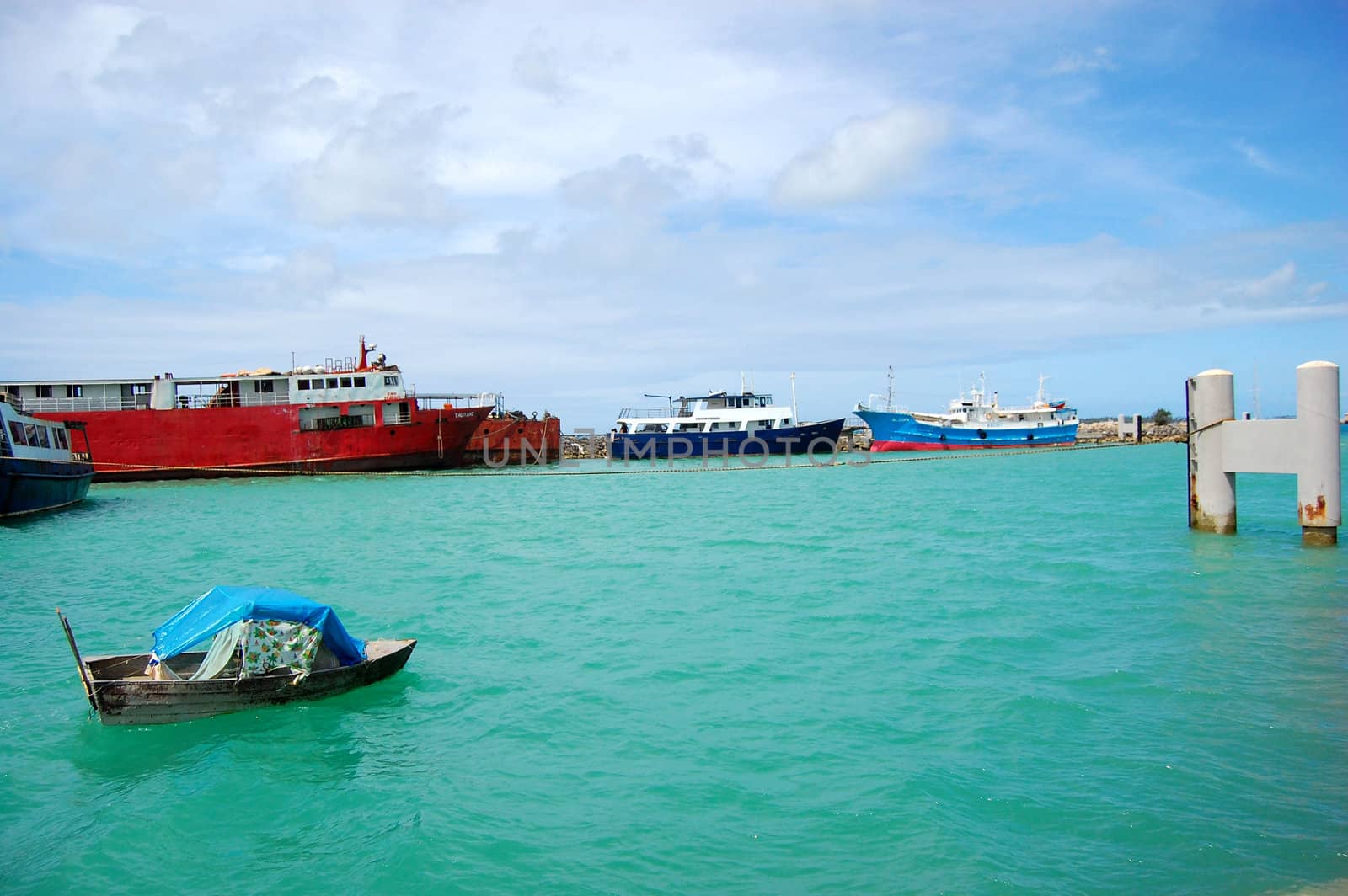 Boat and ships at port, South Pacific, Tonga