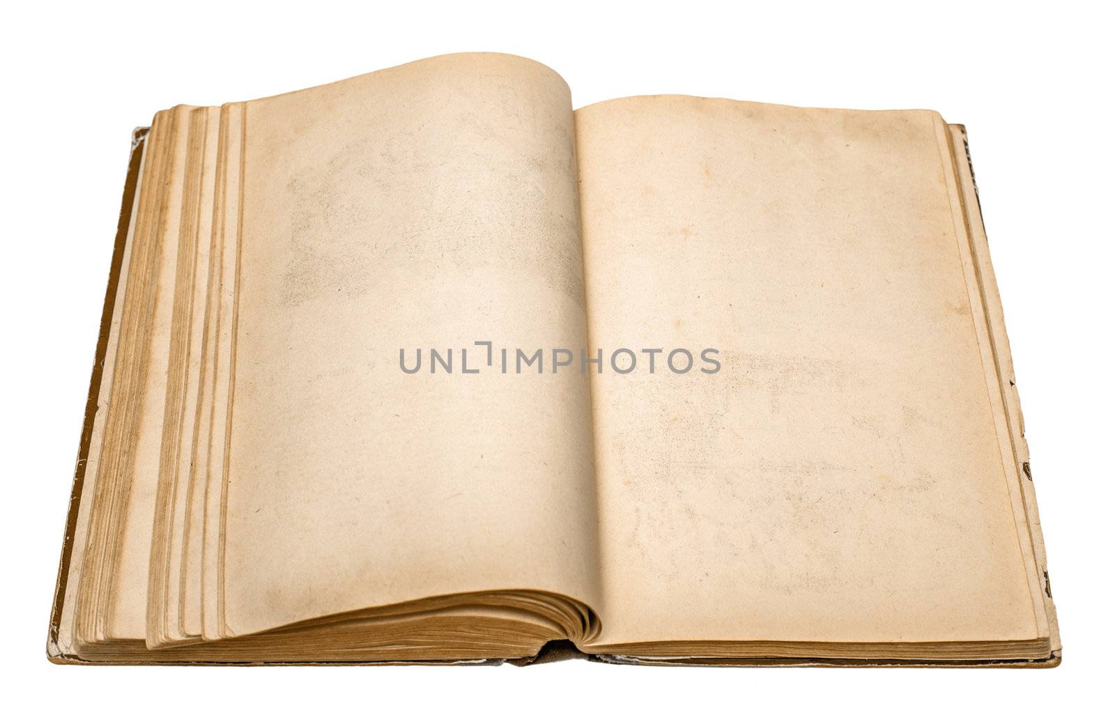 an old open book on white background