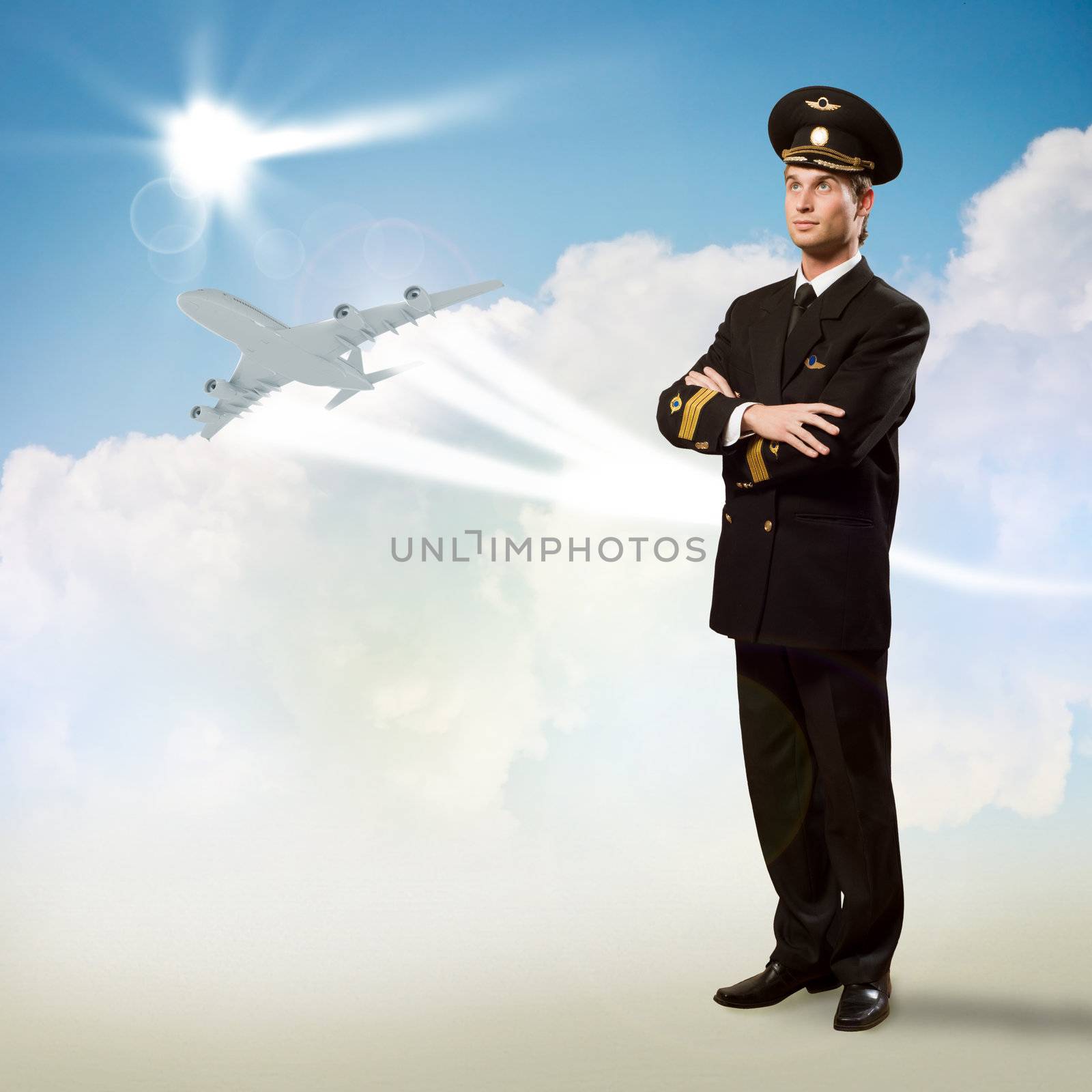 pilot is in the form of arms folded, against the sky, the clouds and the plane