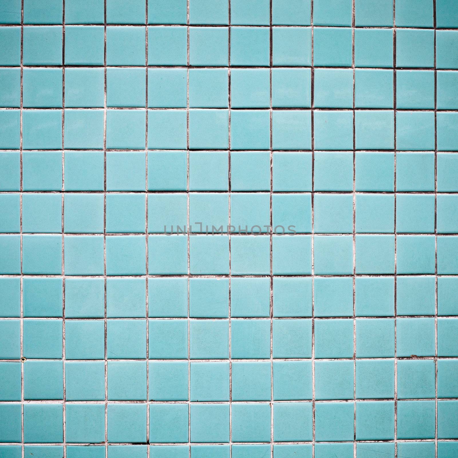 Blue tiles on a wall as a background image