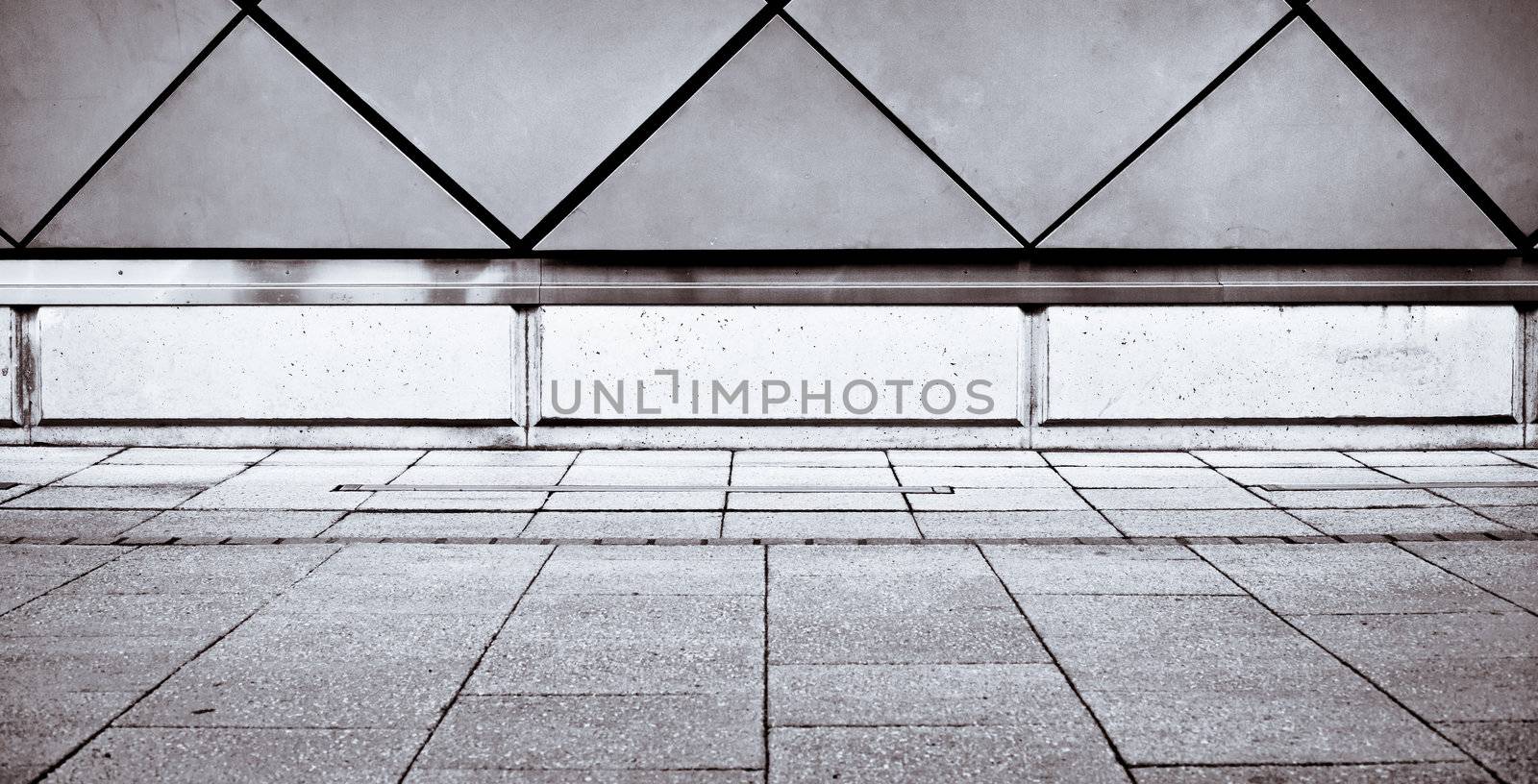 Modern wall and paving stones in dramatic black and white