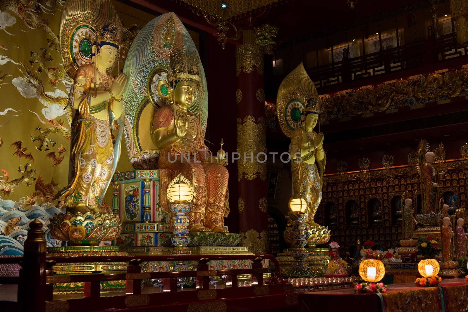 Buddha in Tooth Relic Temple interior in China Town, Singapore 