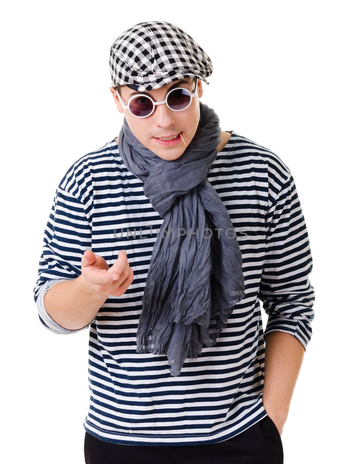 Young suspicious looking stylish twister man in striped clothes isolated on white background