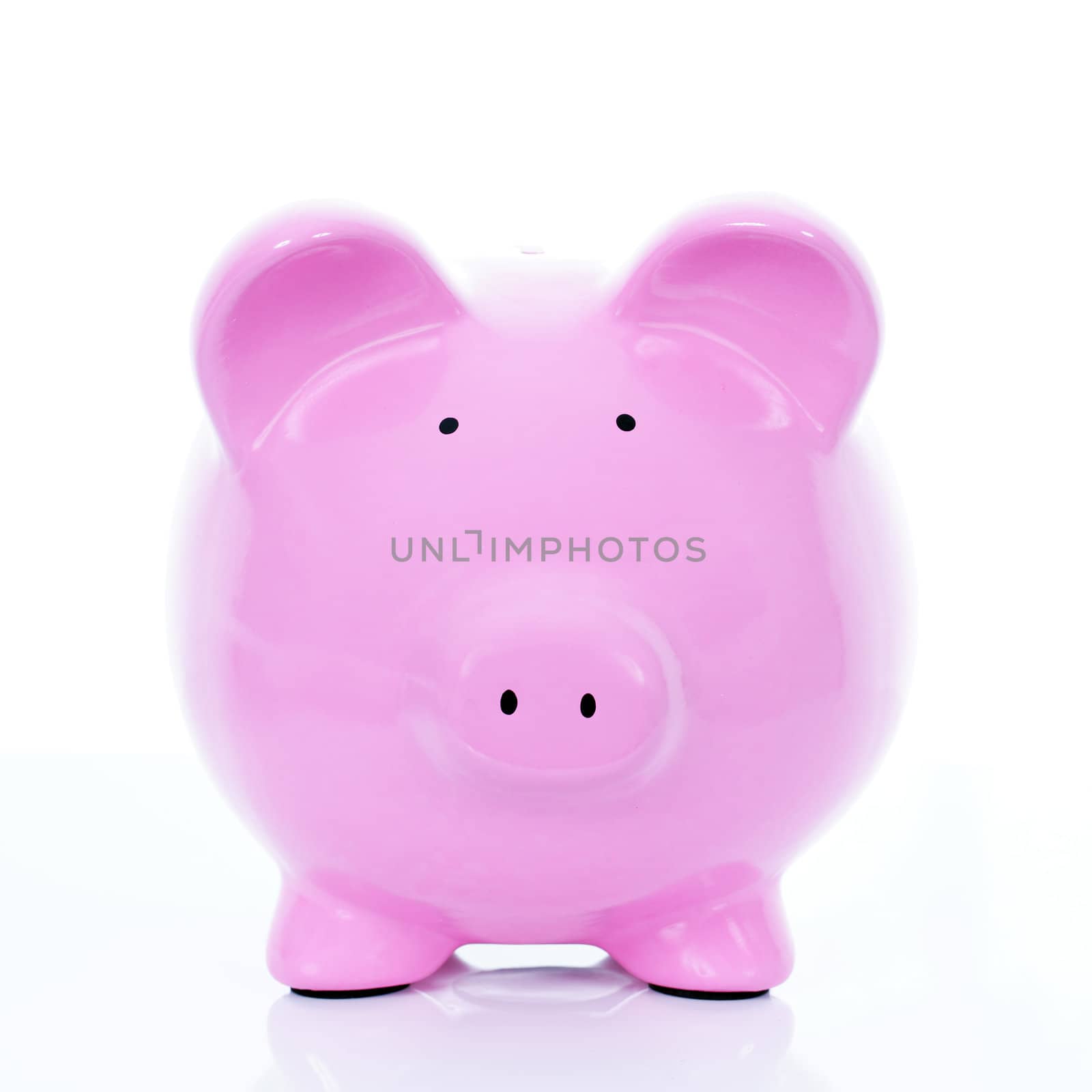 Pink piggy bank, isolated on white 