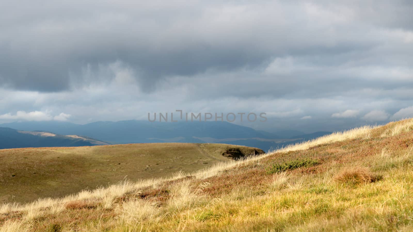 View of the mountain range Svydovets, Autumn day. Carpathian Biosphere Reserve, Ukraine (UA), Eastern Europe. The Svydovets is a mountain range in western Ukraine, one range among the Eastern Beskids and the Ukrainian Carpathians, itself part of the Outer Eastern Carpathians.