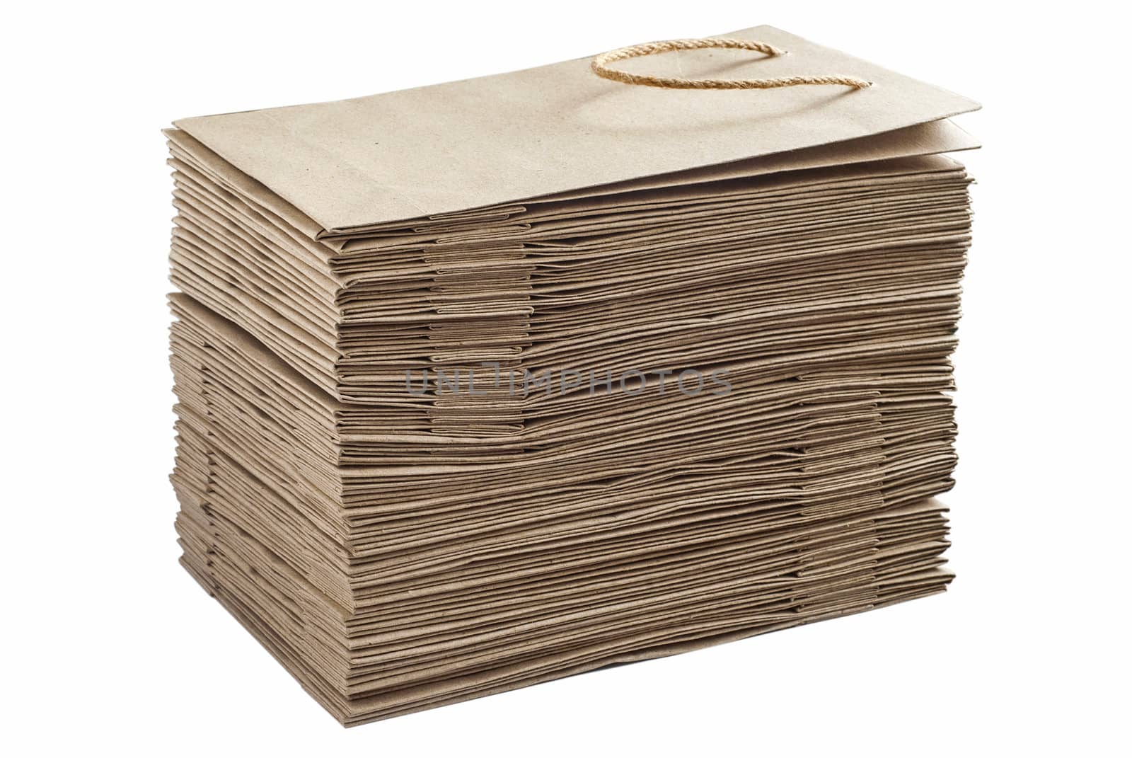 Stacked paper bags isolated on white background