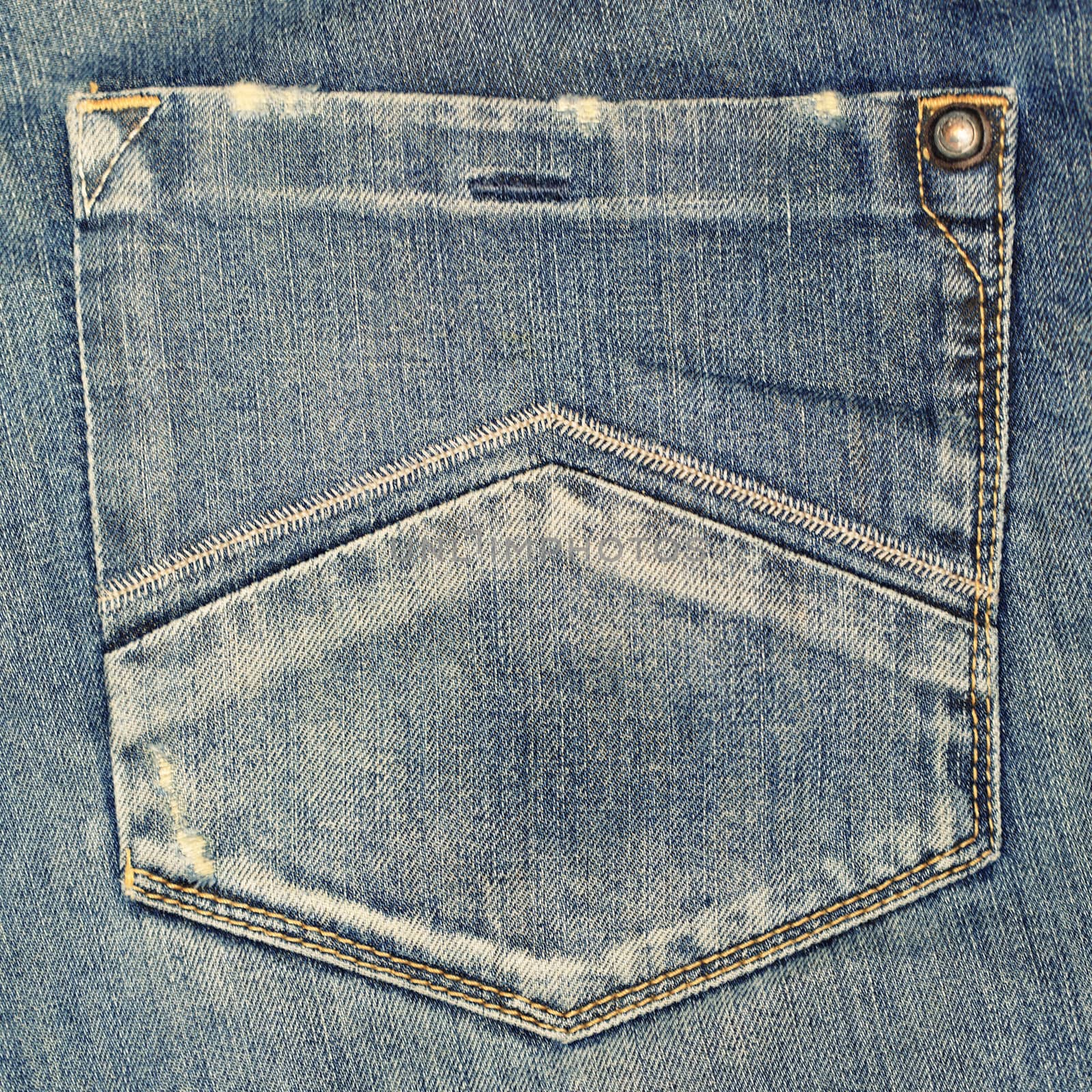 Blue jeans fabric with back pocket