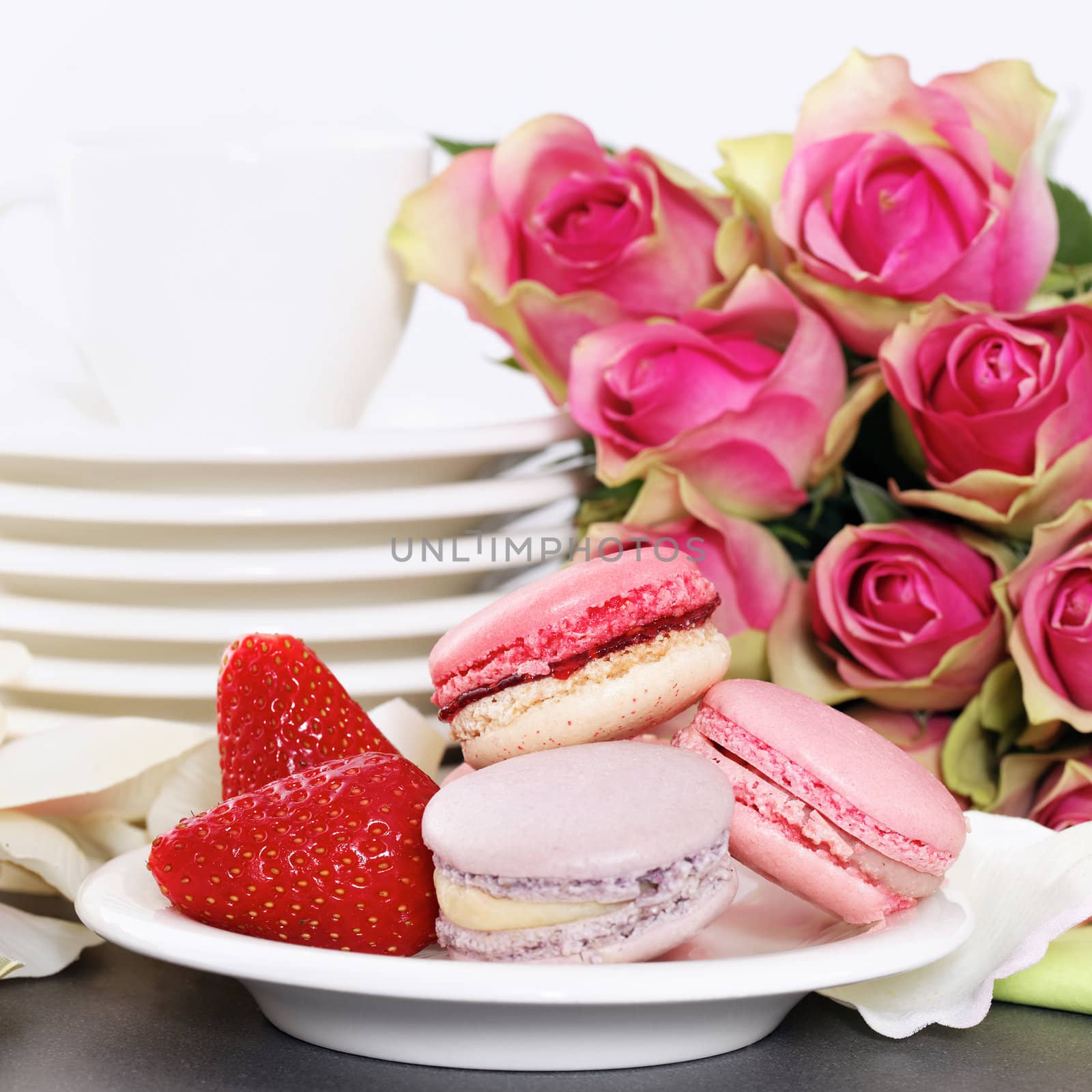 Dessert on valentine's include macaroons, coffee and strawberry