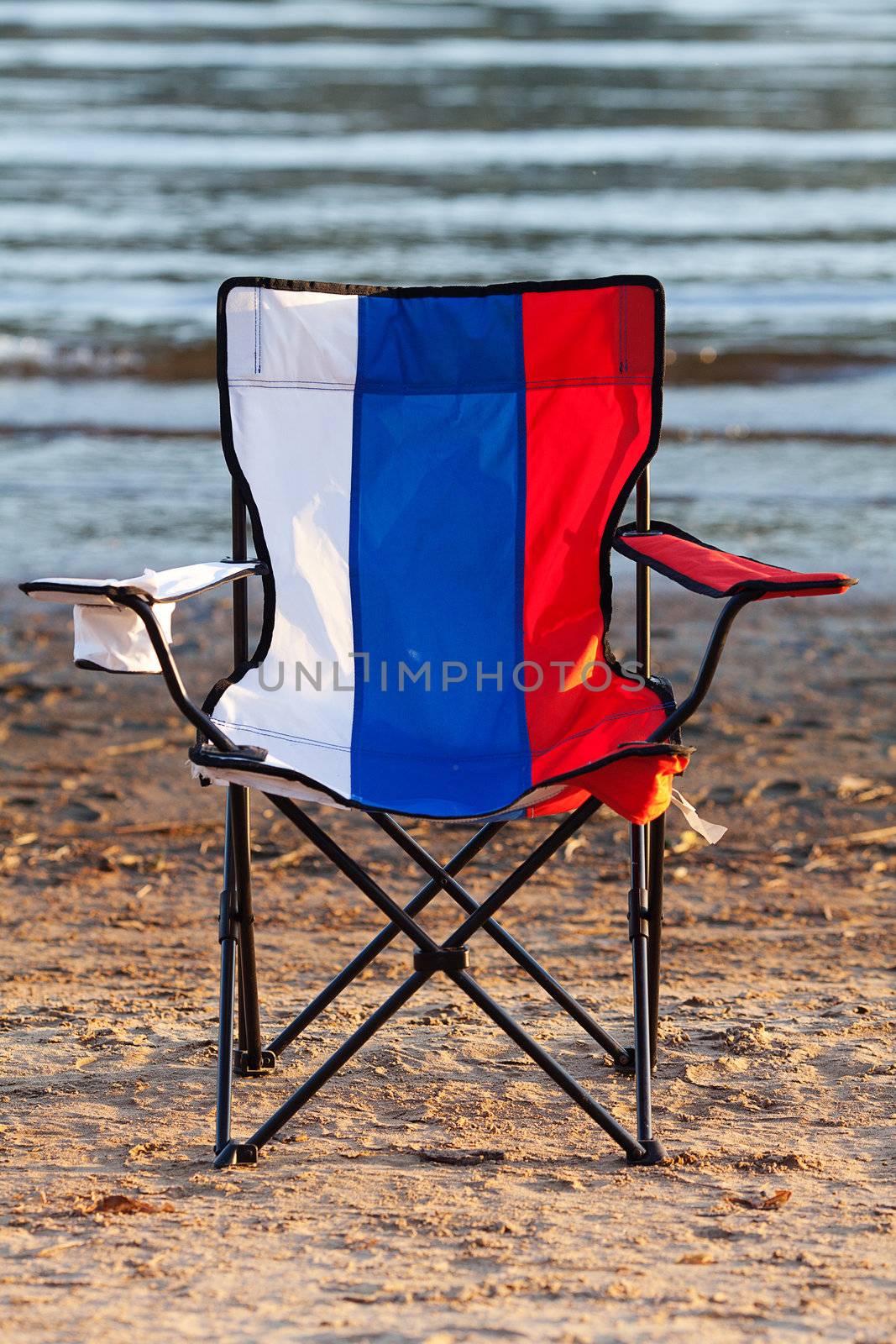 lounge in the color of a Russian flag on the background of the river