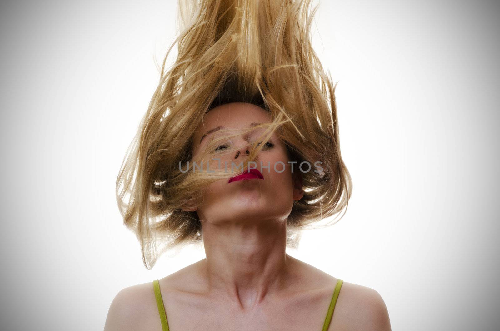 woman with hair flying in the air by Grufnar