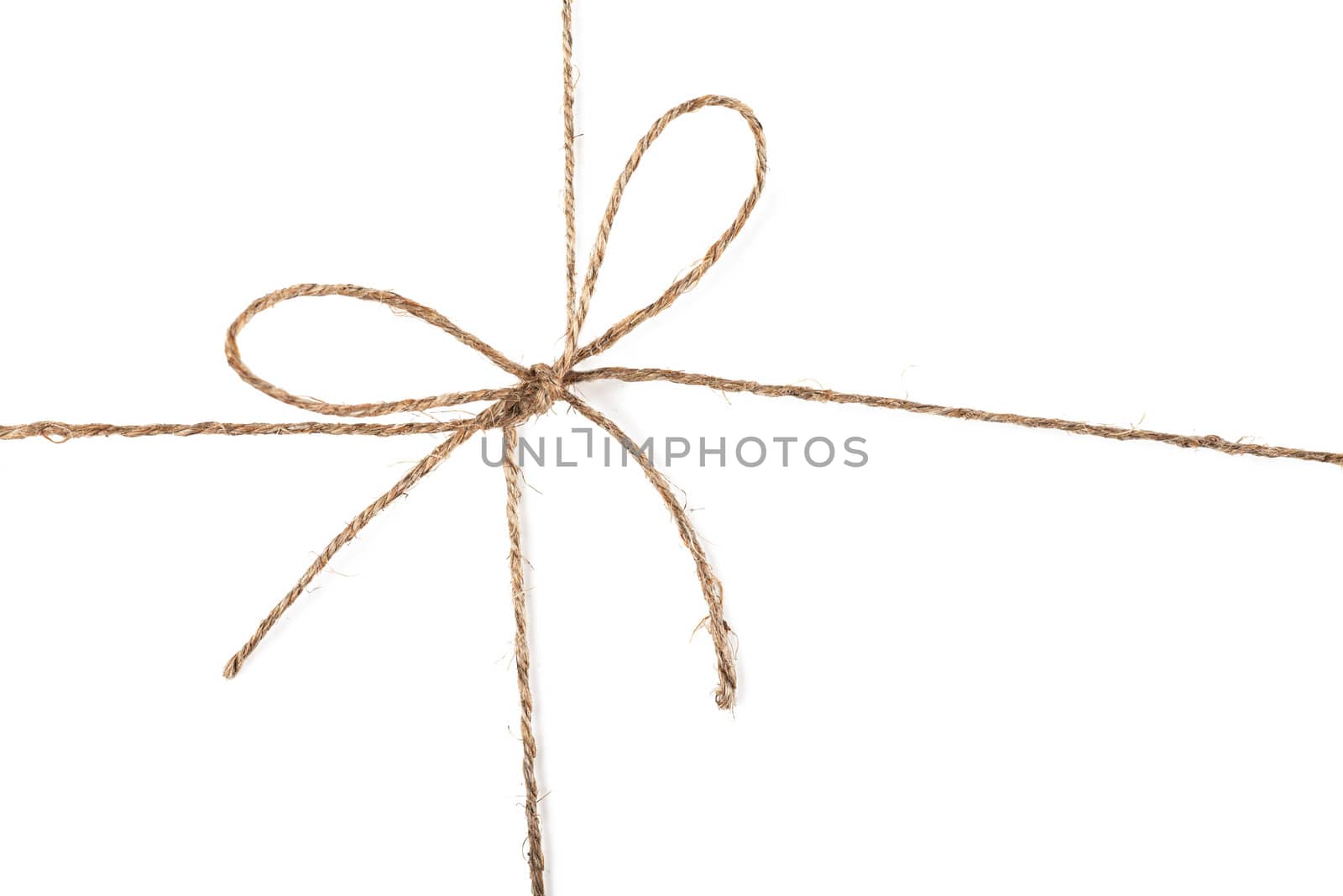 Closeup view of string knot over white background