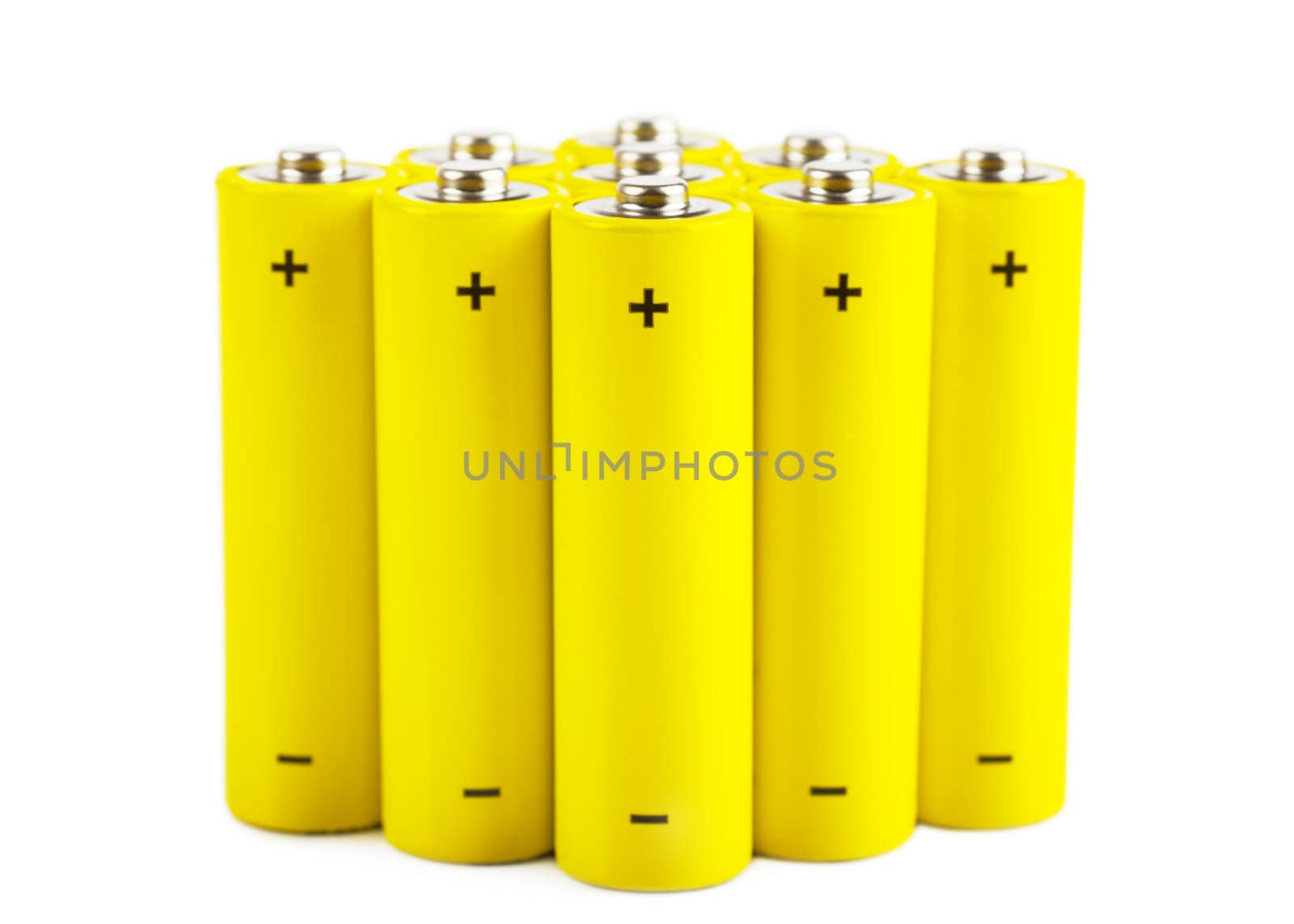 Yellow batteries isolated over white background