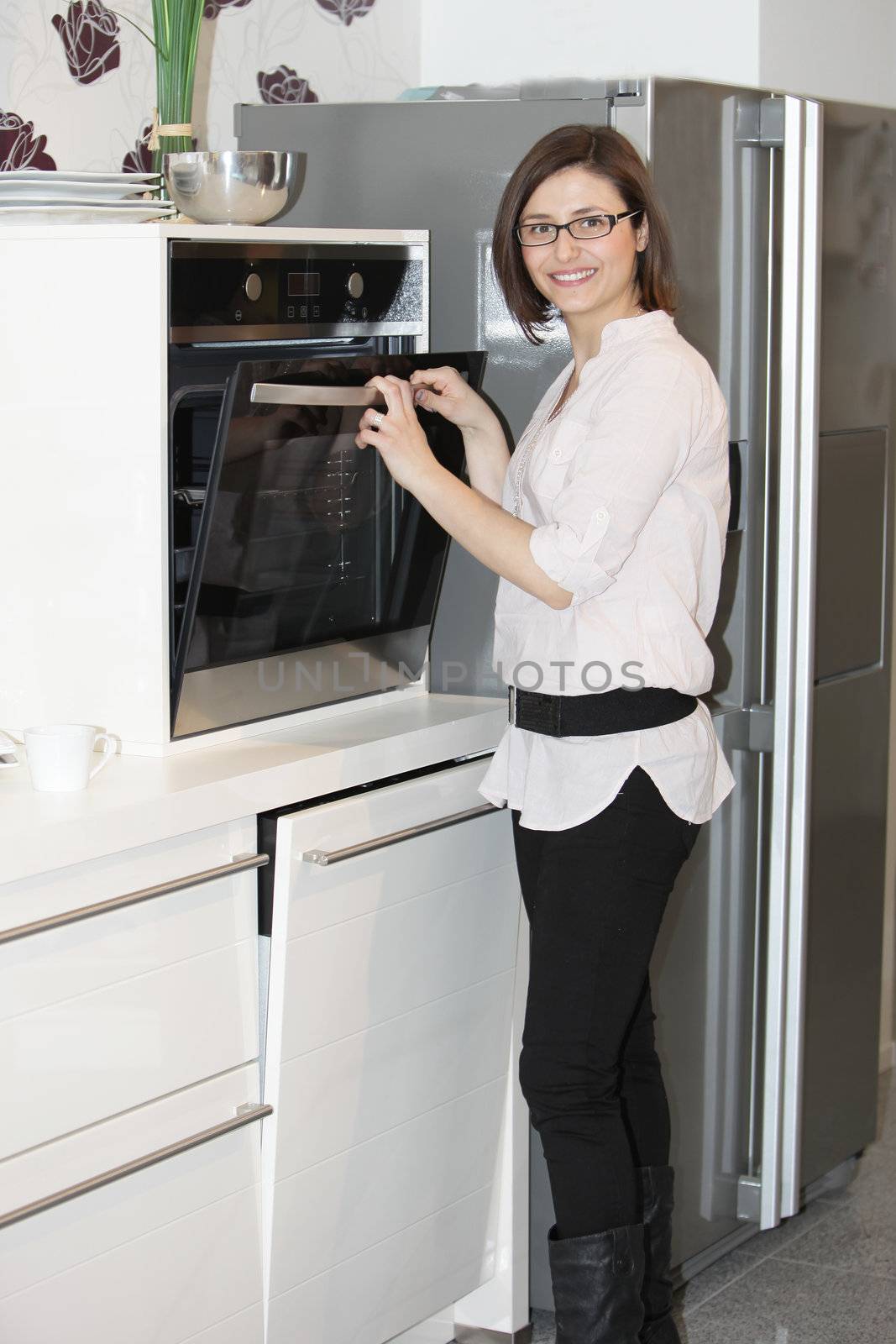 Stylish young woman cooking by Farina6000