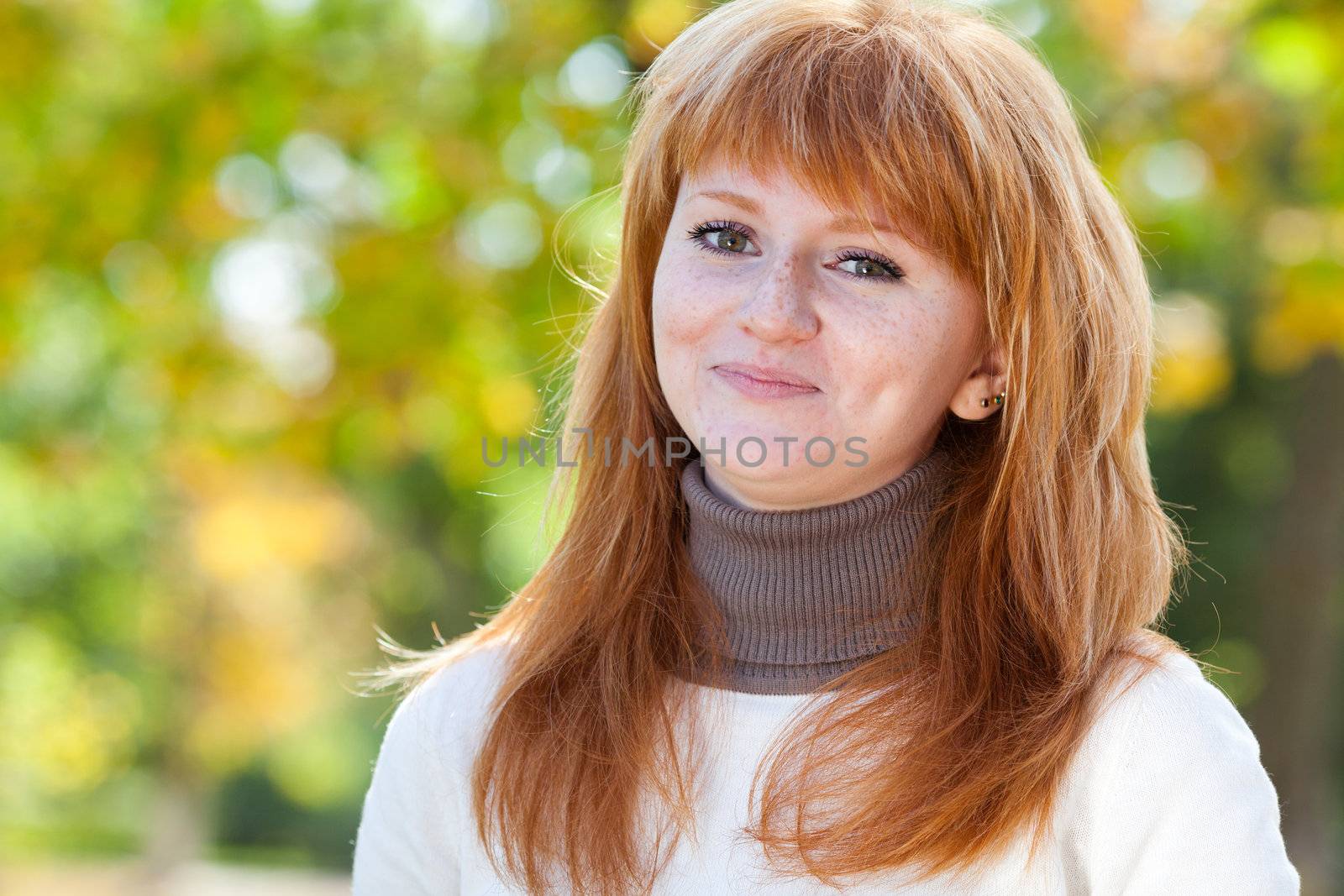 portrait of a beautiful young redhead teenager woman 