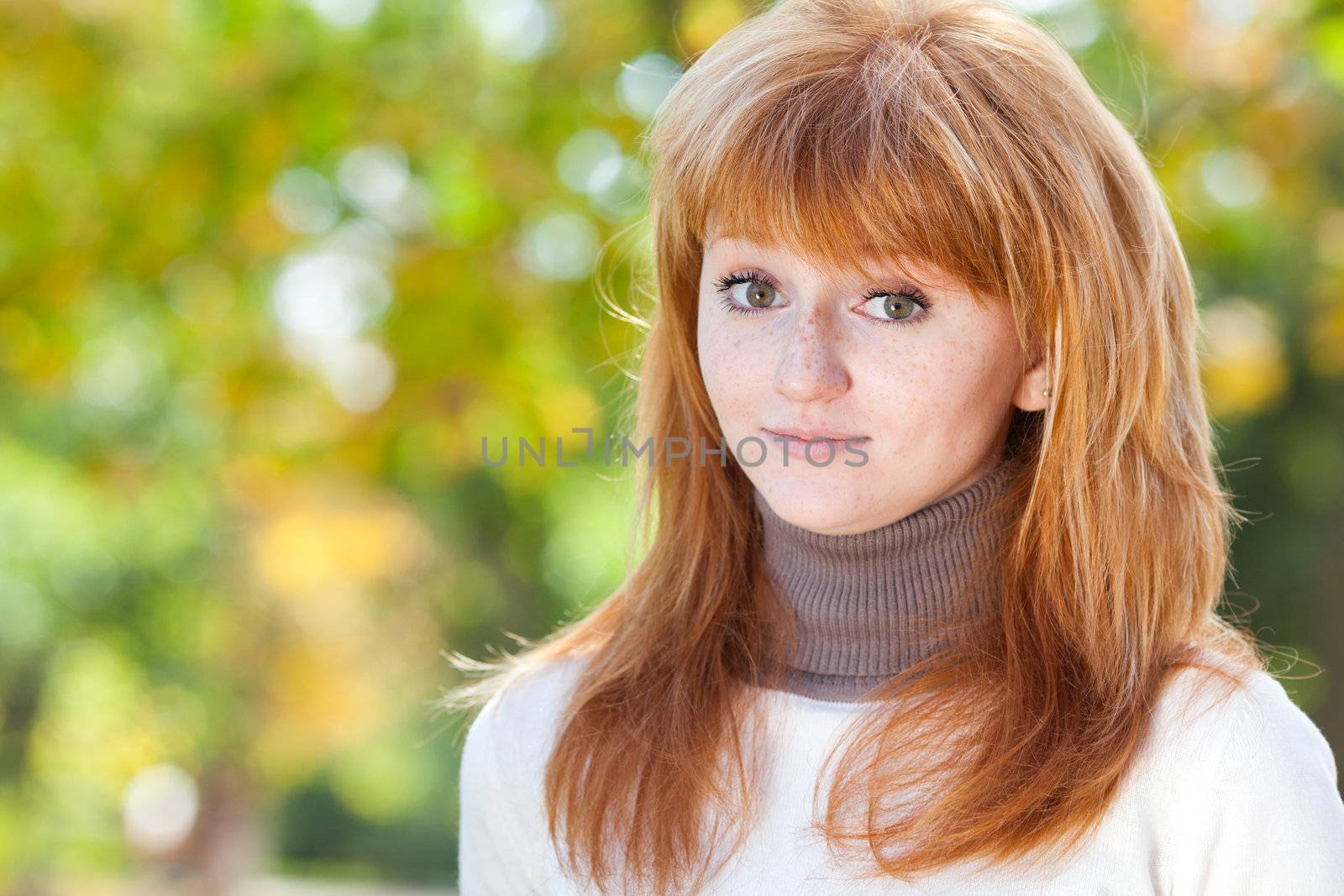 portrait of a beautiful young redhead teenager woman 