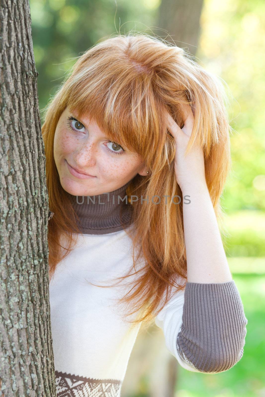 portrait of a beautiful young redhead teenager woman 