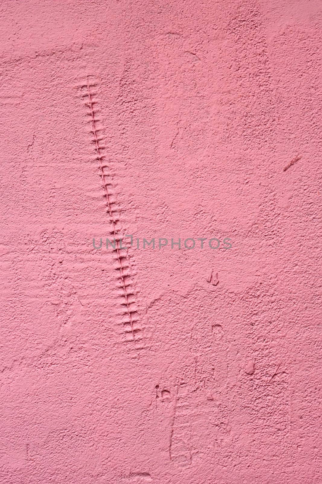 Detail of painted wall covered with plastic mesh under construction glue close up