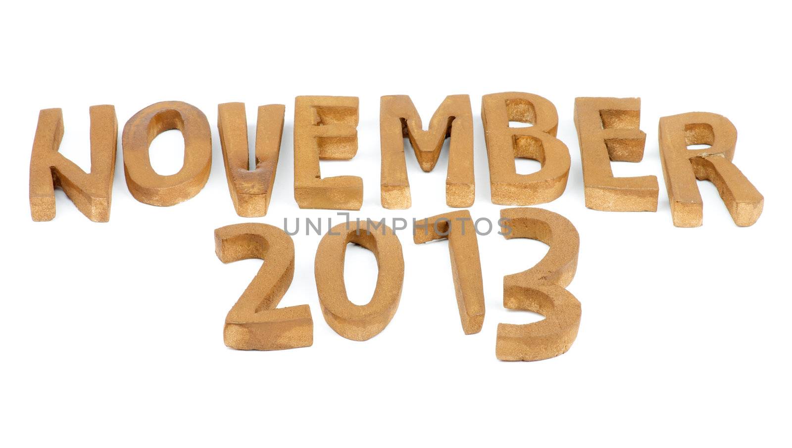 Wooden Handmade Letters "November 2013" isolated on white background