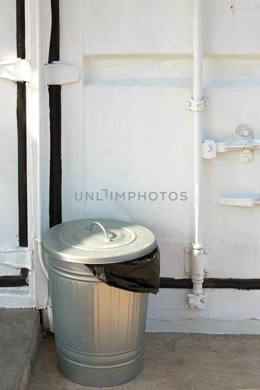 Steel trash can with black plastic