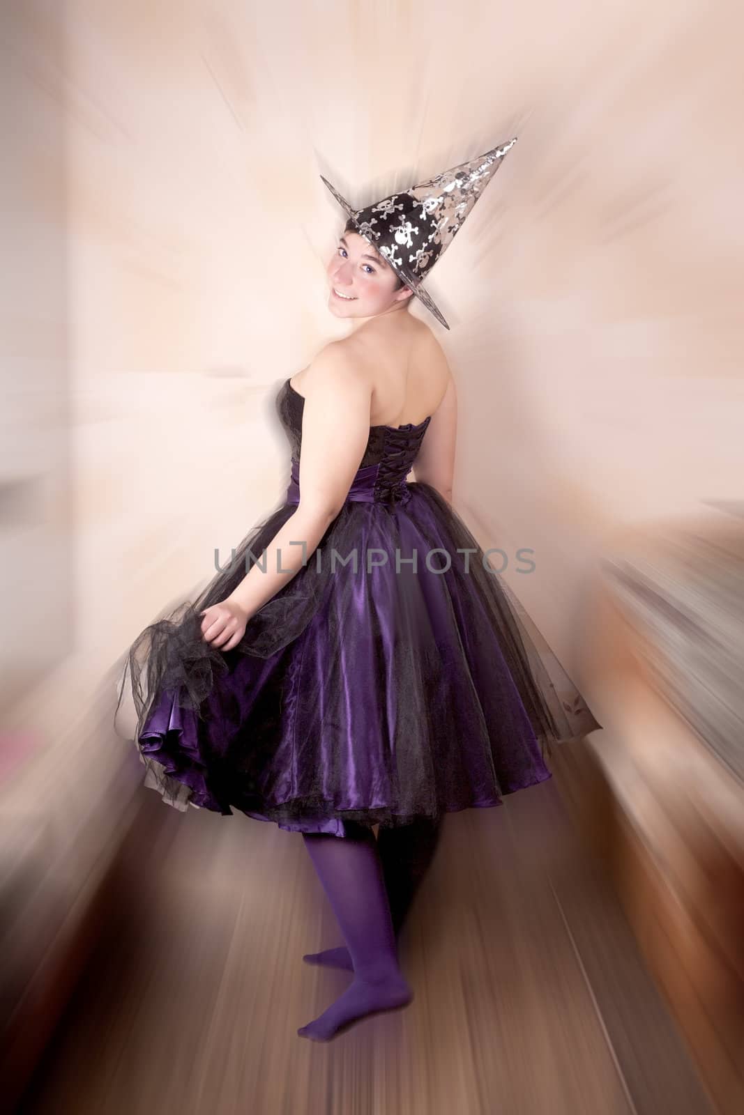 Girl dressed in a fairy costume purple-black, radial background