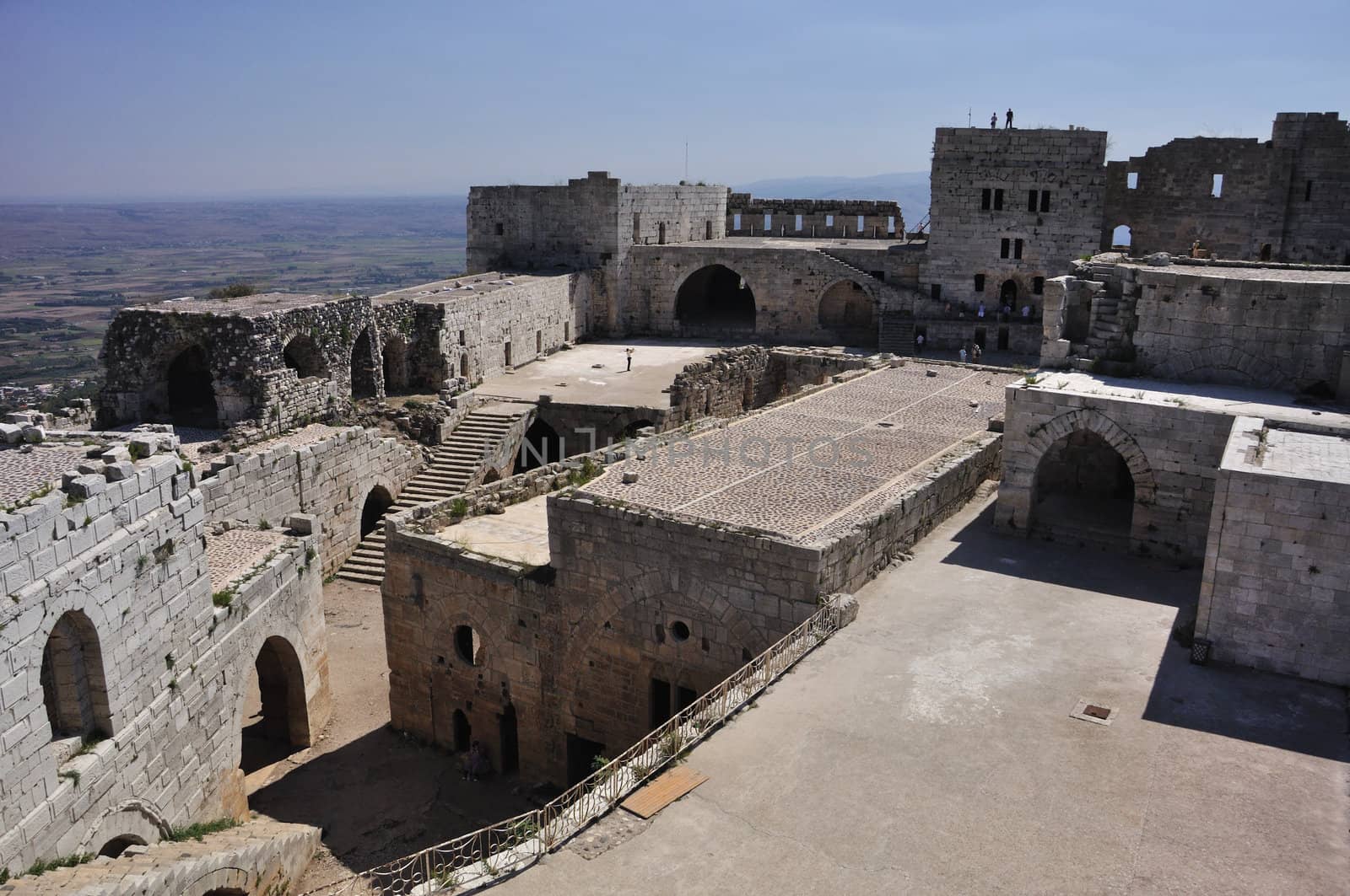 Krak des Chevaliers, transliterated Crac des Chevaliers, is a Crusader fortress in Syria and one of the most important preserved medieval military castles in the world.