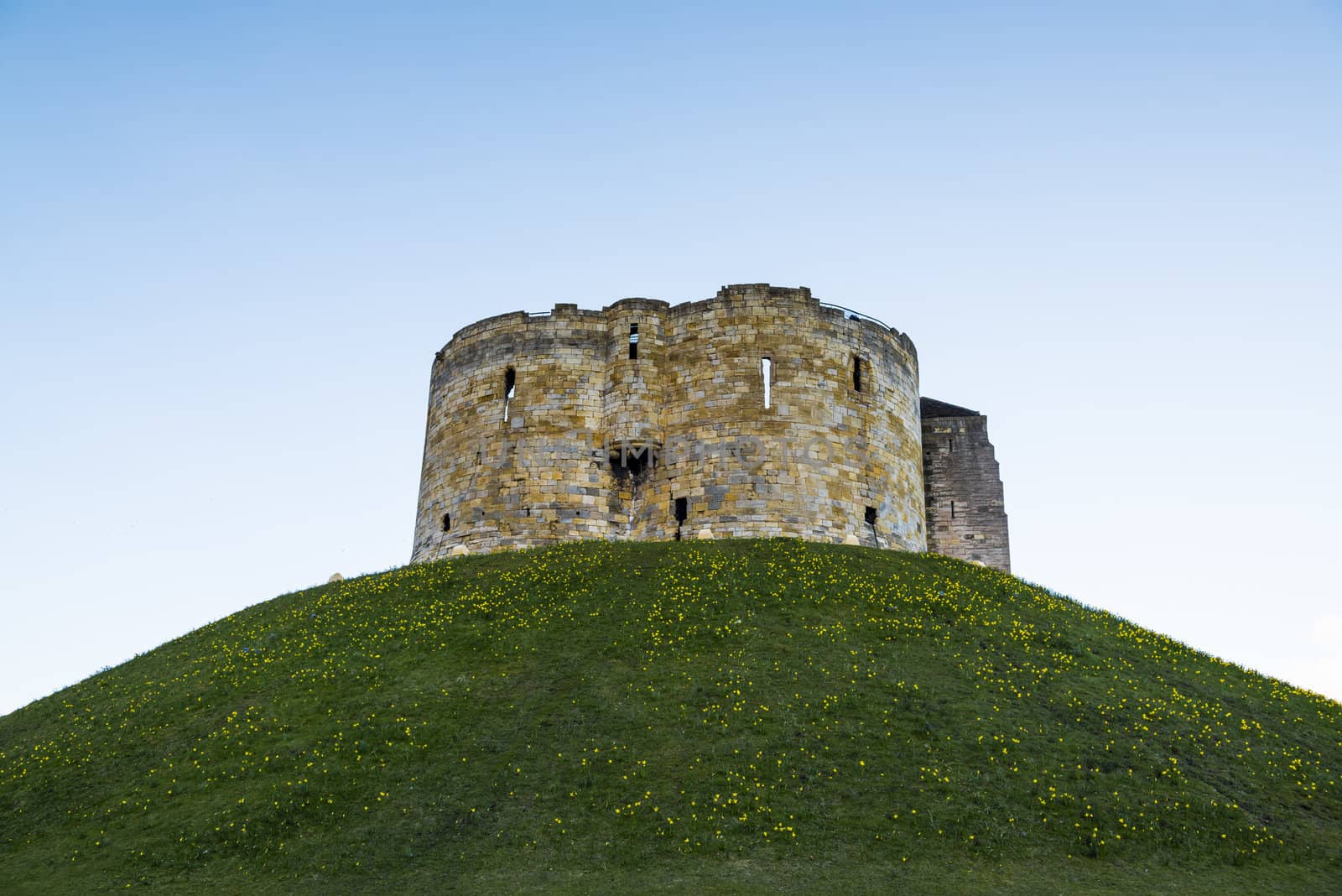 East face of Clifford's Tower, in York, UK. The tower is part of the York castle.
