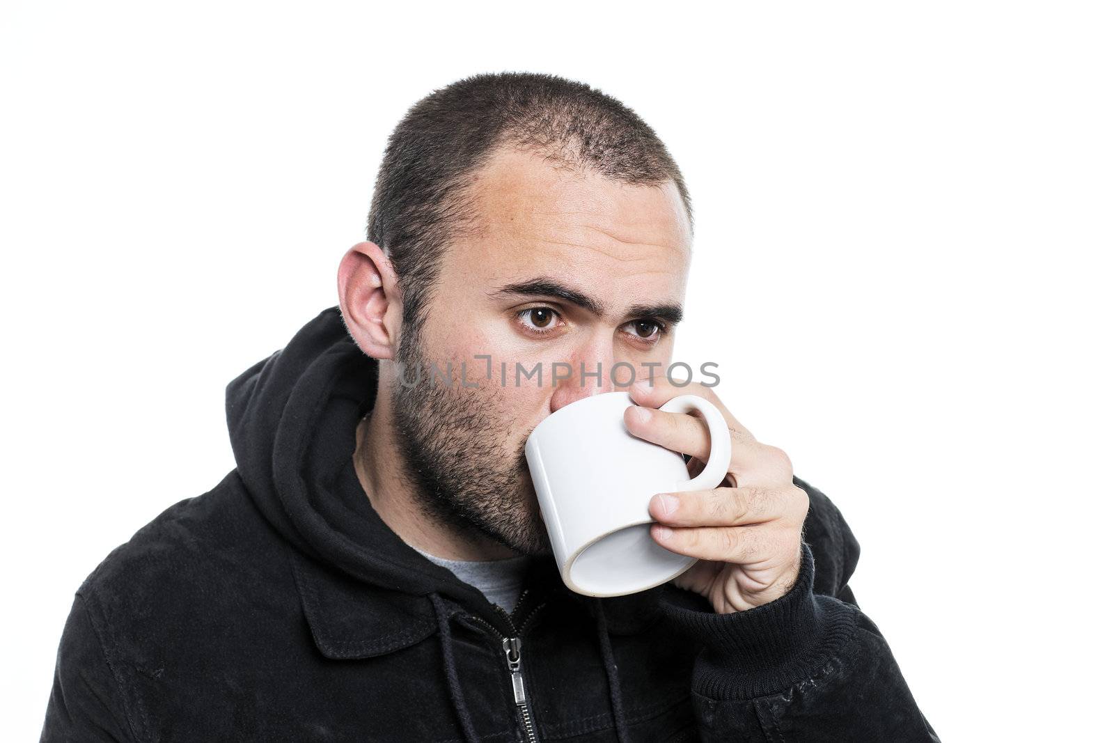lonely man drinking tea in a cup