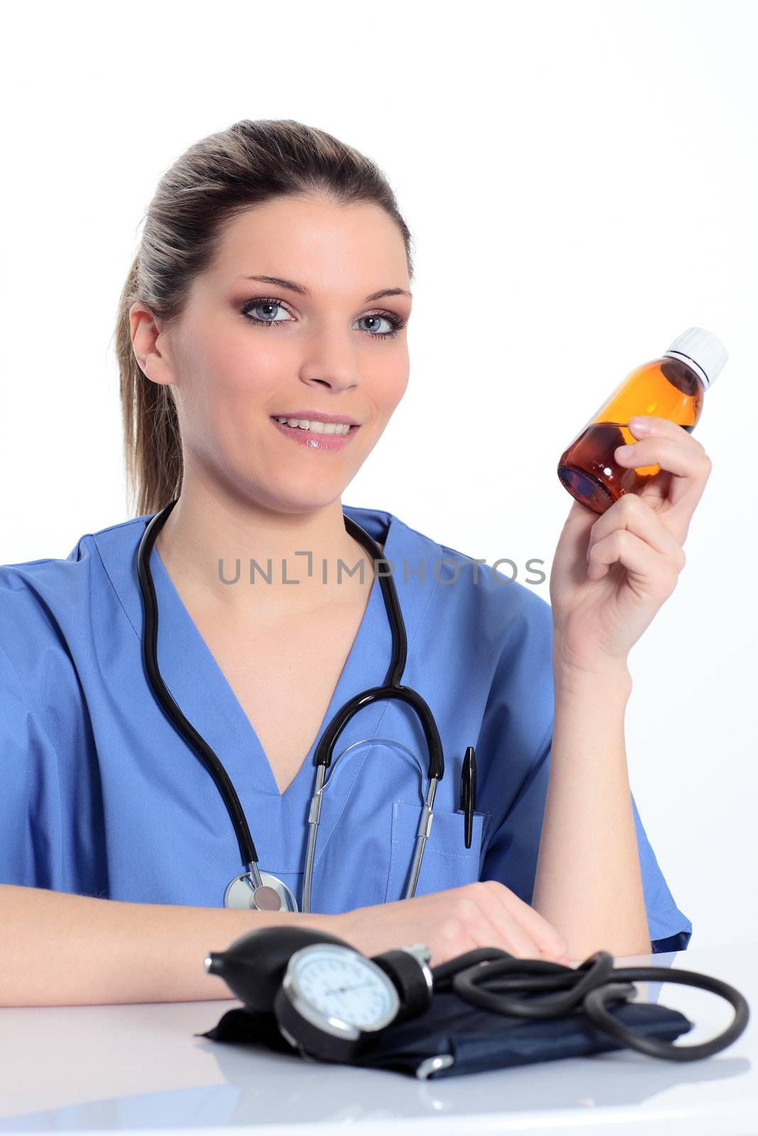 woman doctor with medicine bottle in the hand