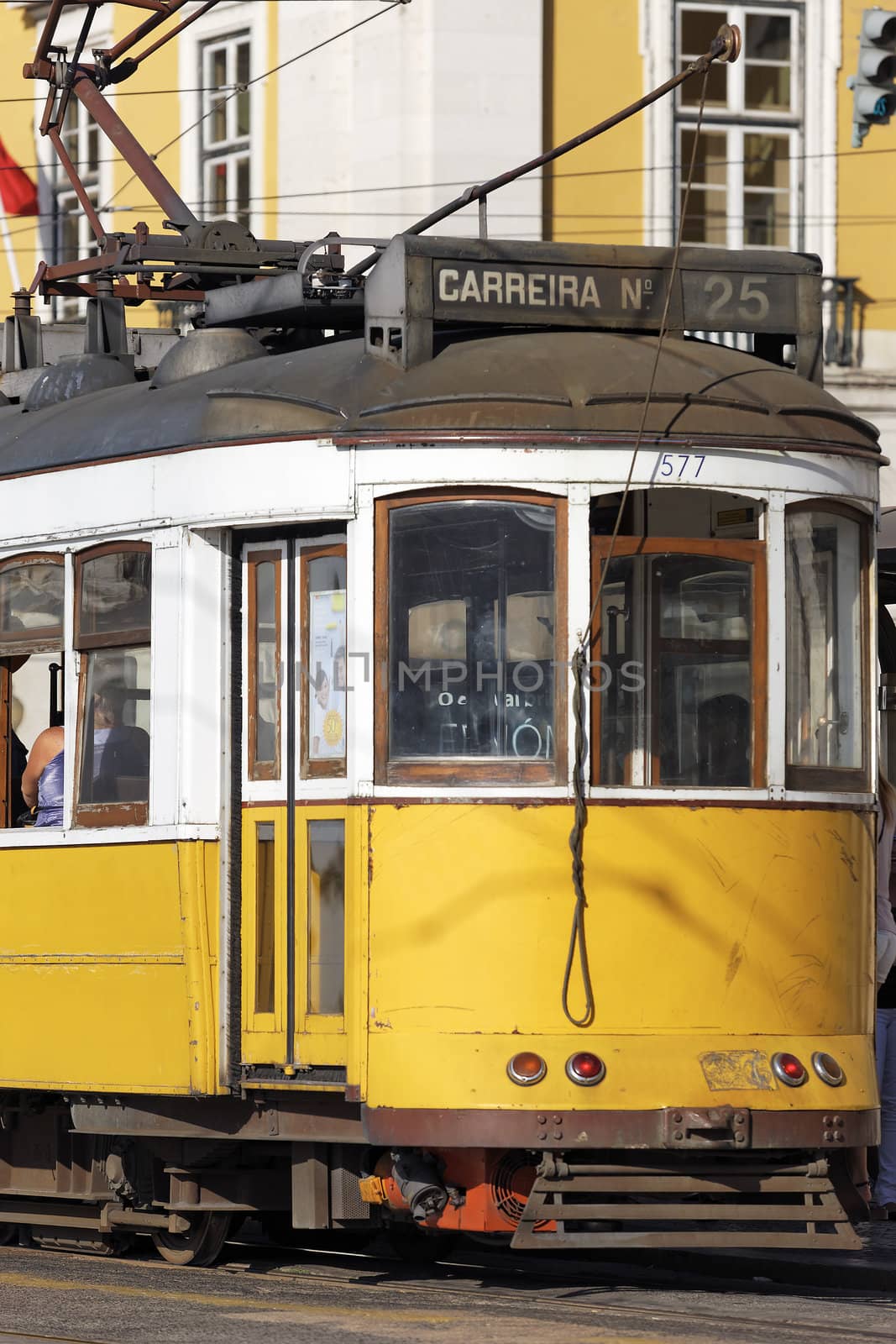 Typical yellow Tram in Lisbon's street