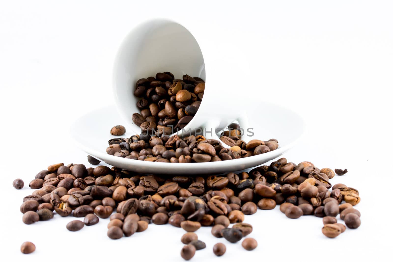 Coffee beans in a cup