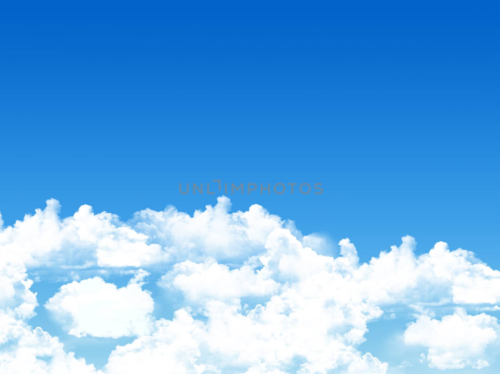 blue sky background with tiny clouds
