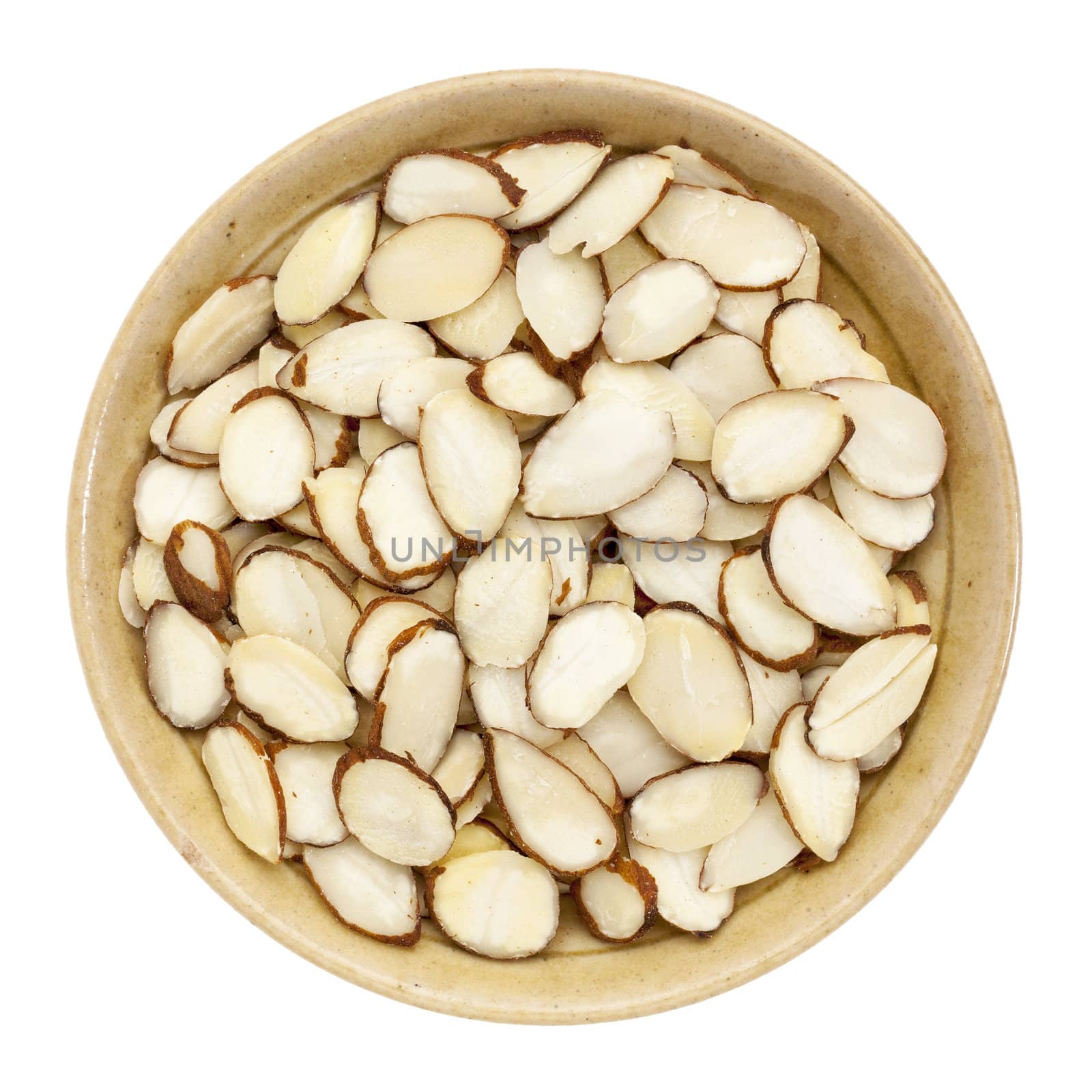 raw sliced almond nuts in a small ceramic bowl isolated on white, top view