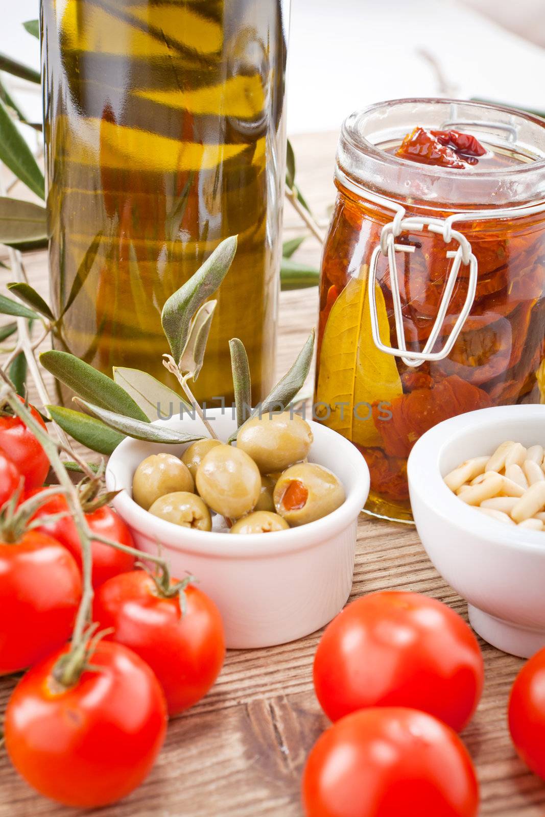 tatsty geen olives tomatoes and olive oil ingredients vegetarian food