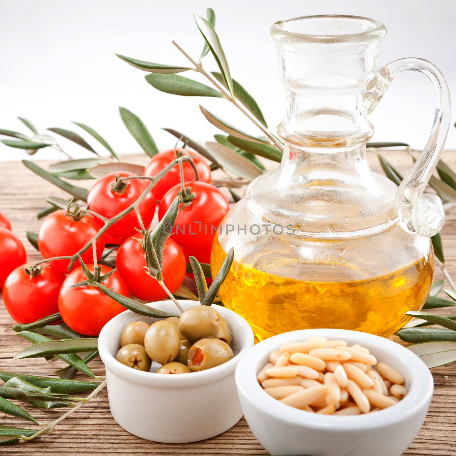 tatsty geen olives tomatoes and olive oil ingredients vegetarian food