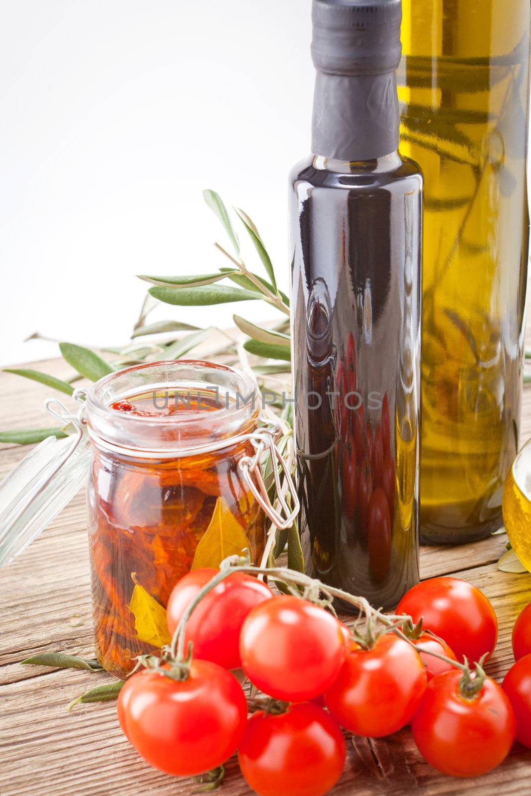 tatsty geen olives tomatoes and olive oil ingredients vegetarian food