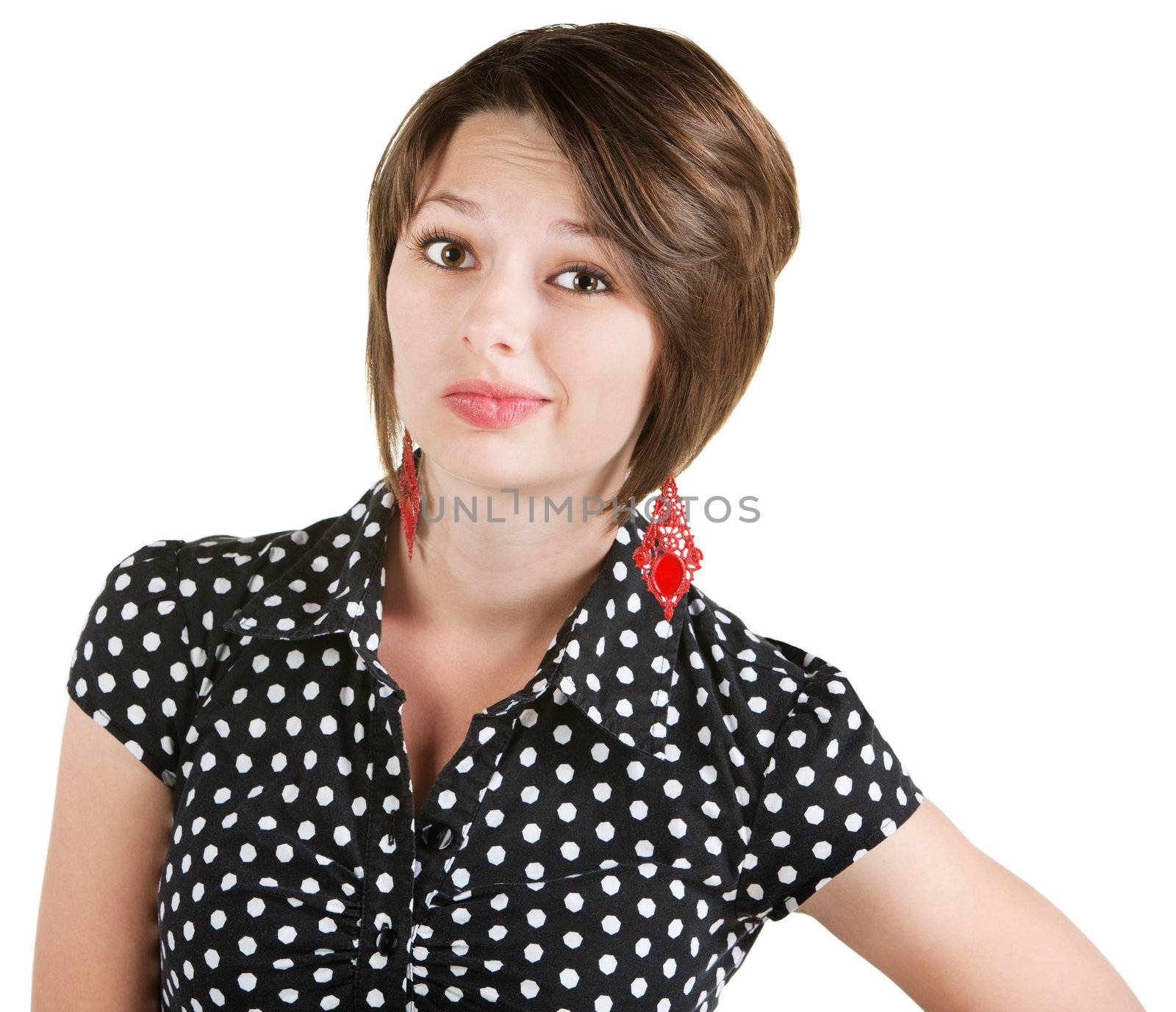 Unimpressed young white female in polka dot blouse