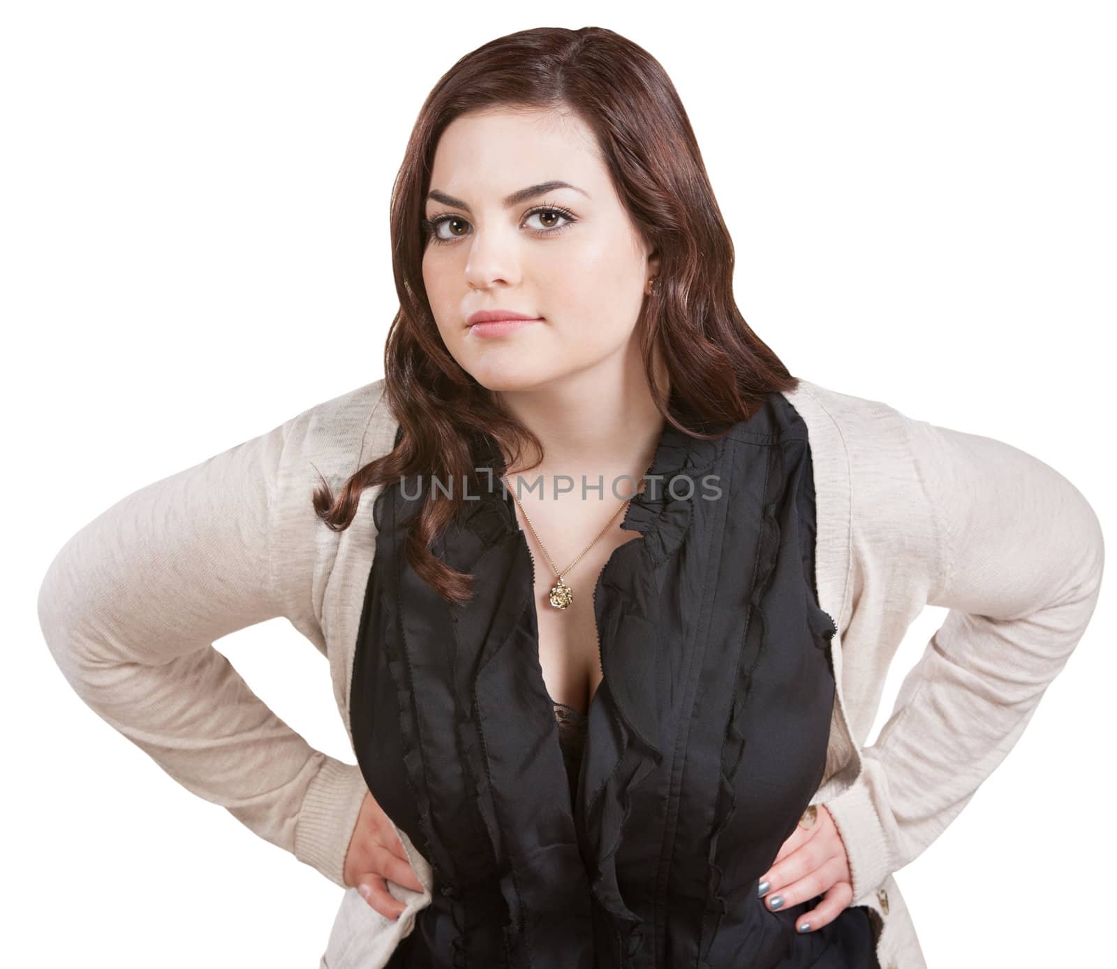 Young Caucasian female with hands on hips leaning forward