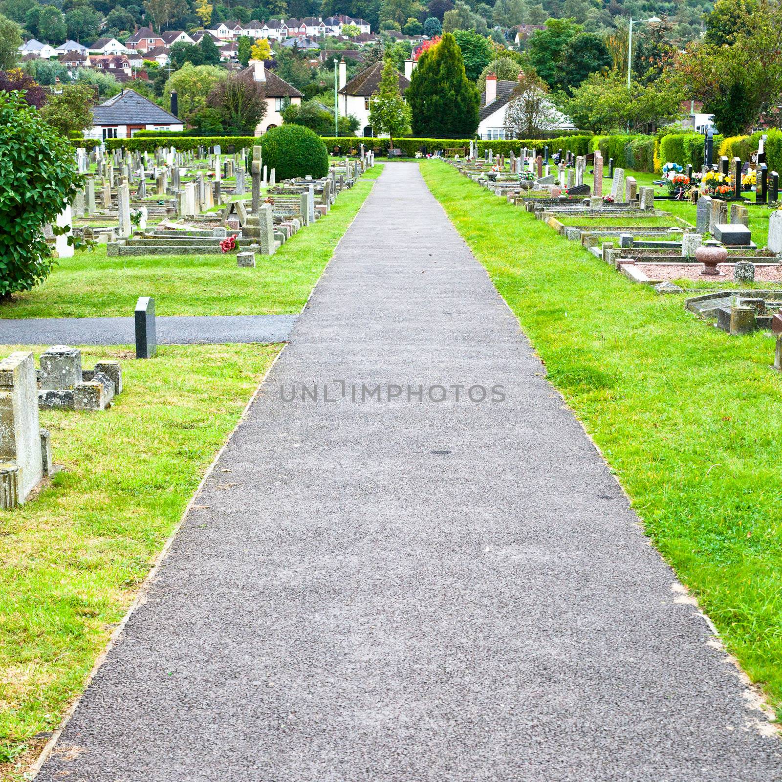 Straight stone path in a cemetary in the UK
