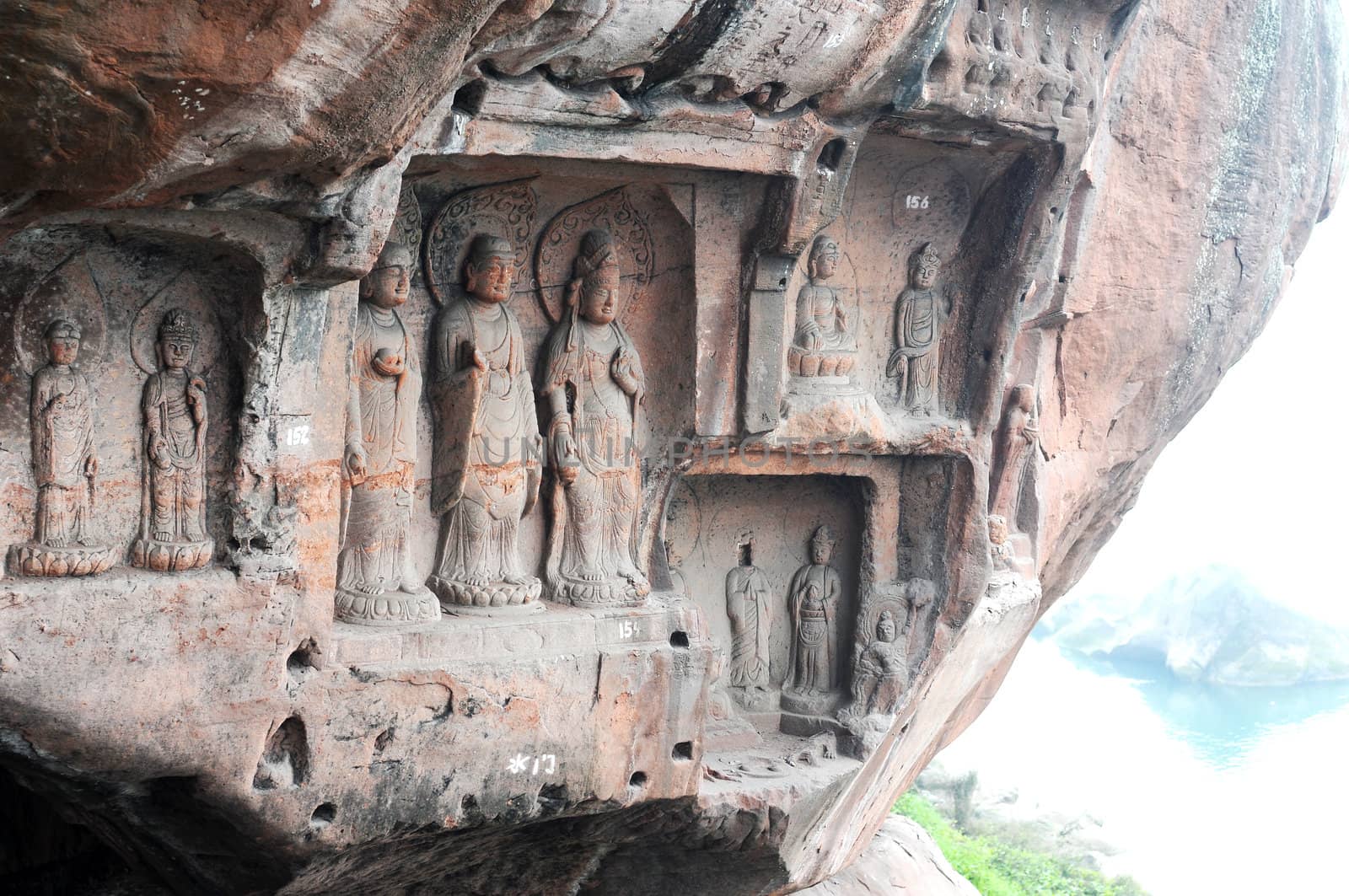 Ancient Buddha statue in caves in Sichuan, China