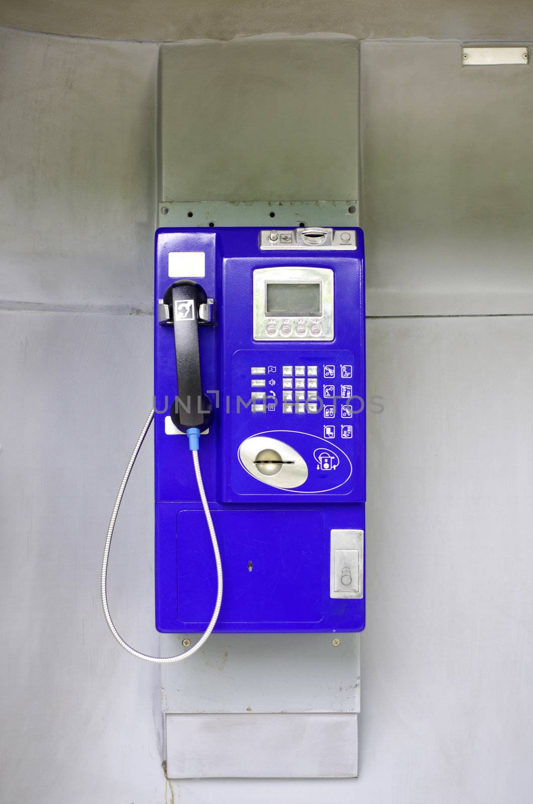 Blue public phone  by siraanamwong