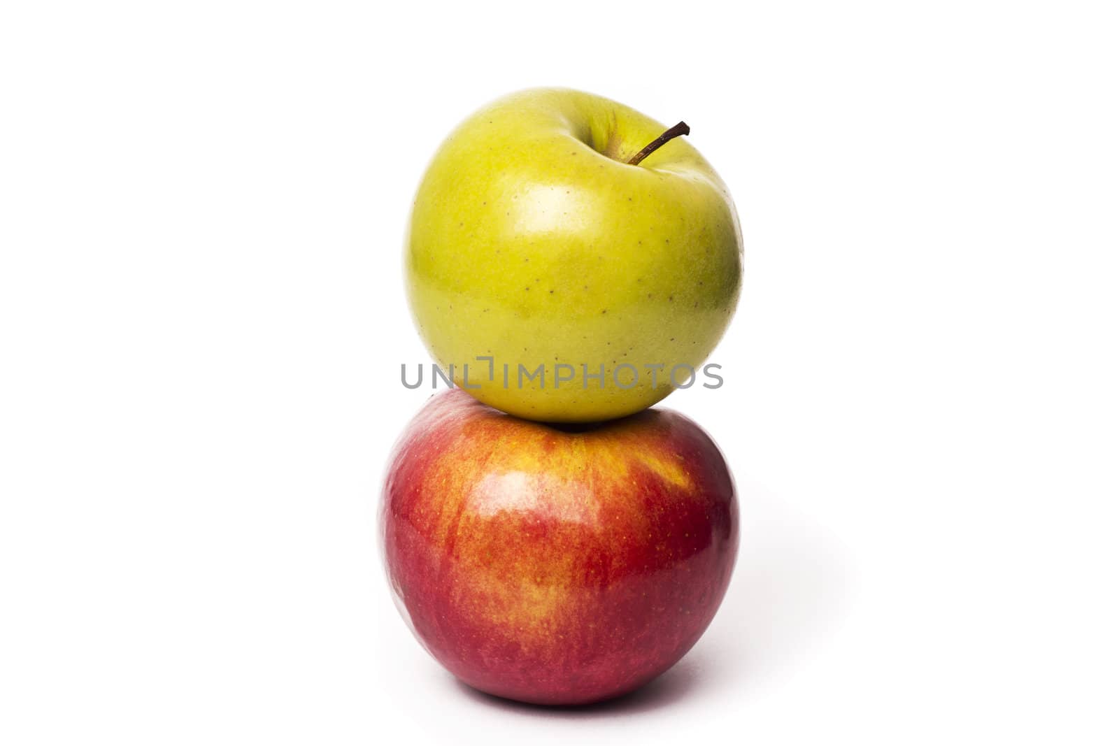Two apples, Red Delicious and Granny Smith, isolated on white background with clipping path.