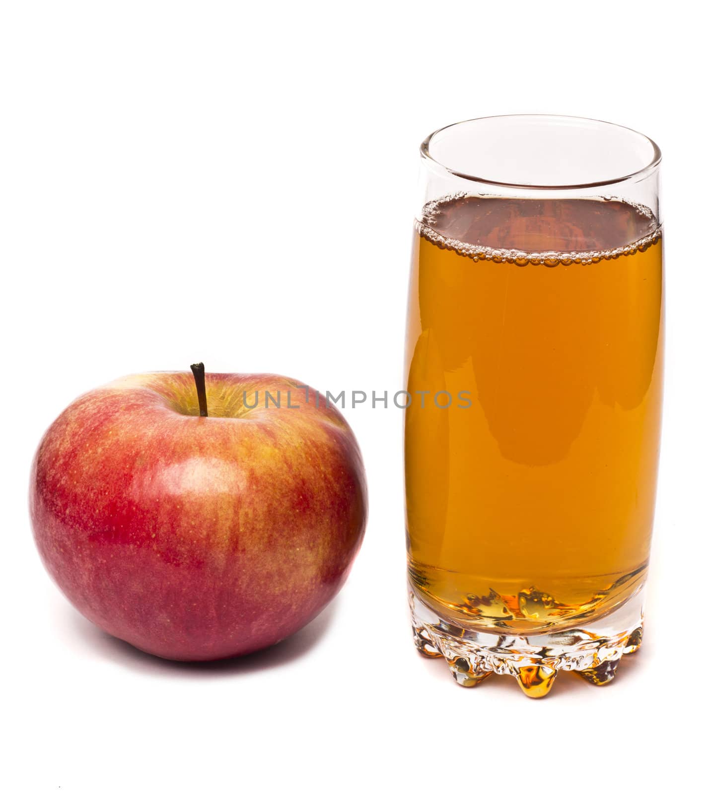 glass of apple juice and apples isolated on white