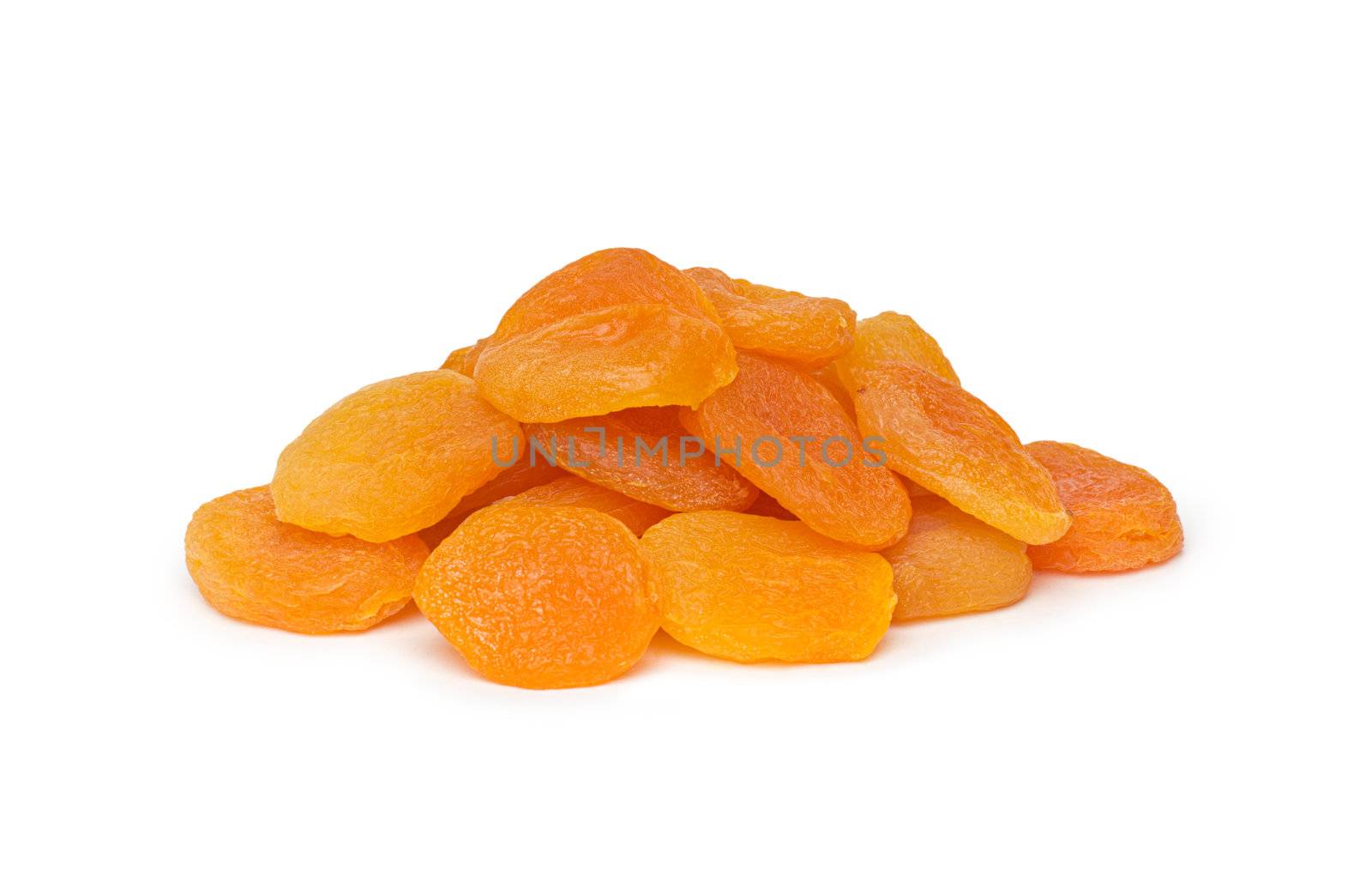 A heap of dried apricots on a white background