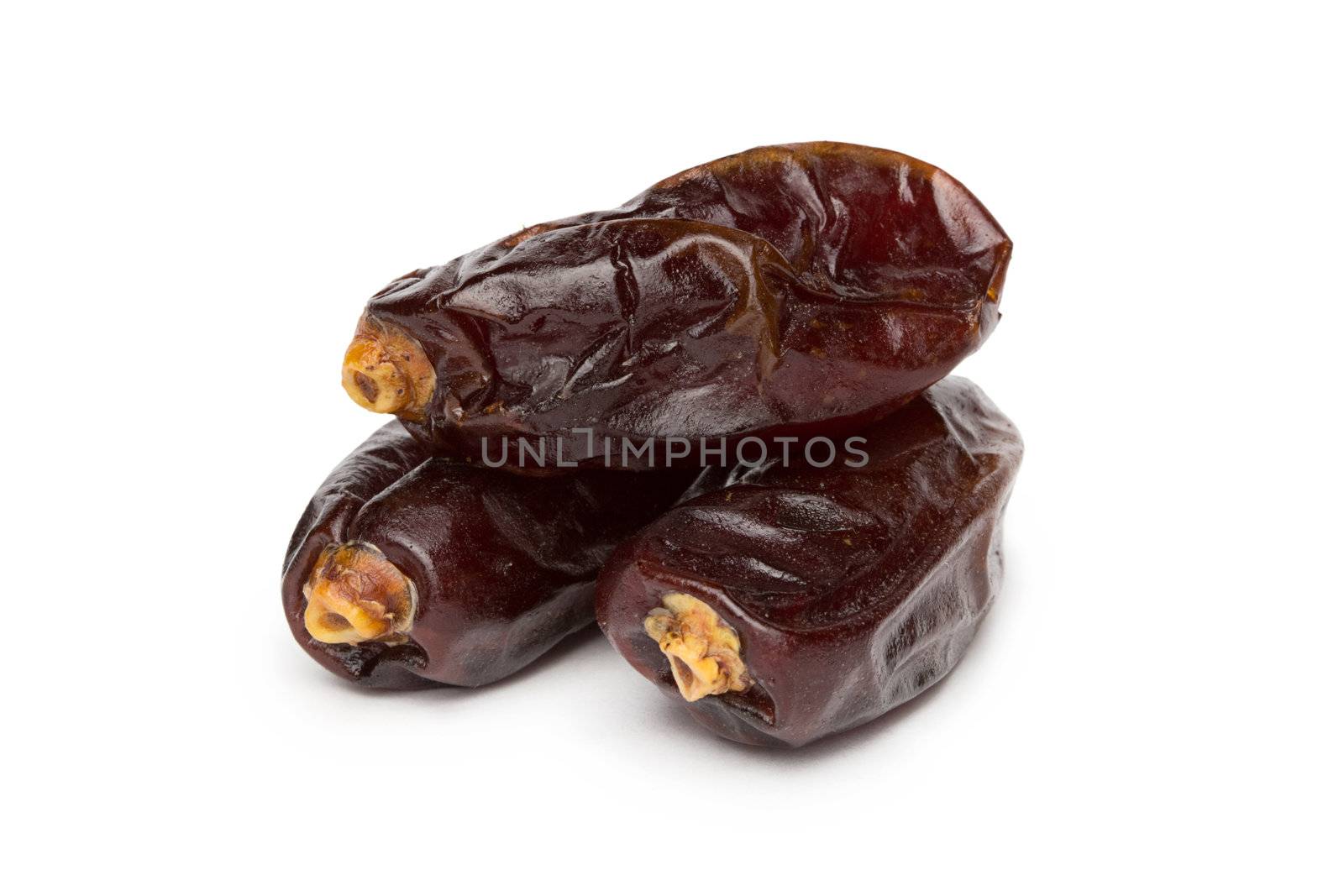 dryed dates on white background