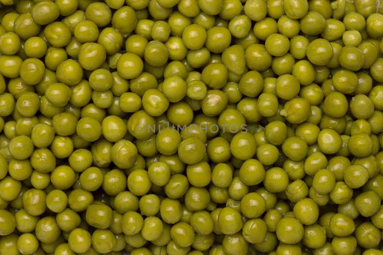 background of wet green peas