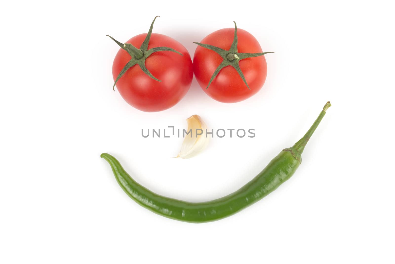 Chili pepper, garlic and tomatos isolated on white background