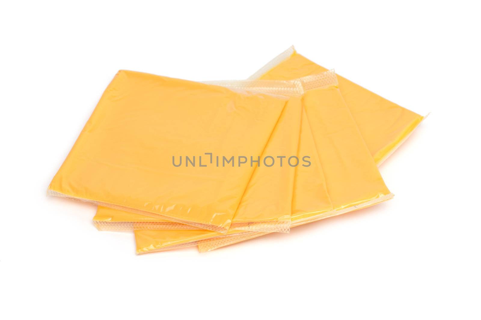 cheddar cheese slices on white background
