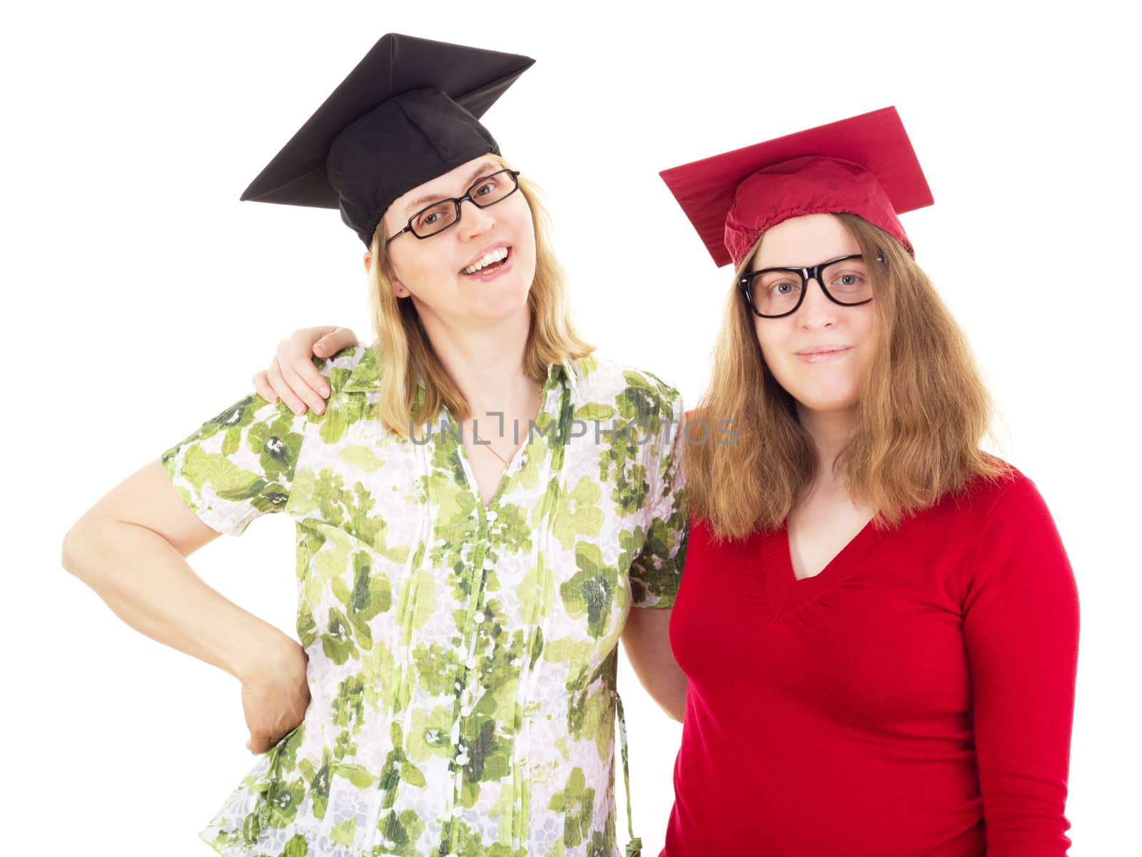 Two happy female graduates by gwolters