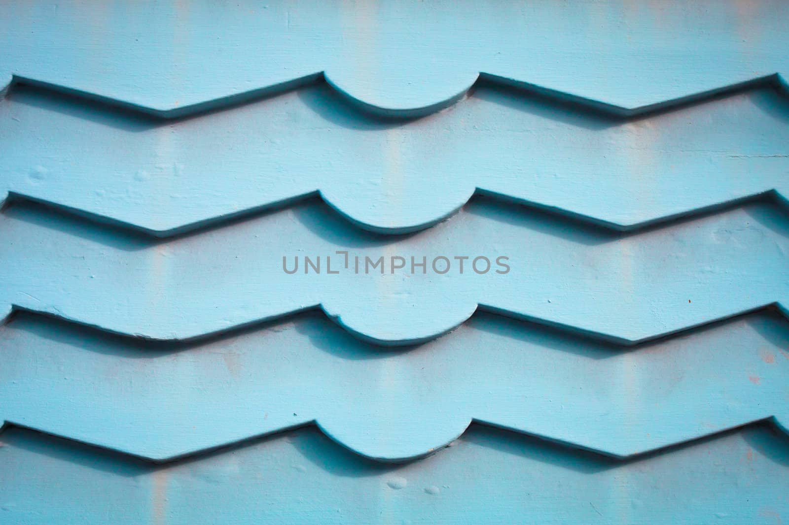 Blue wooden panels on an external wall as a background